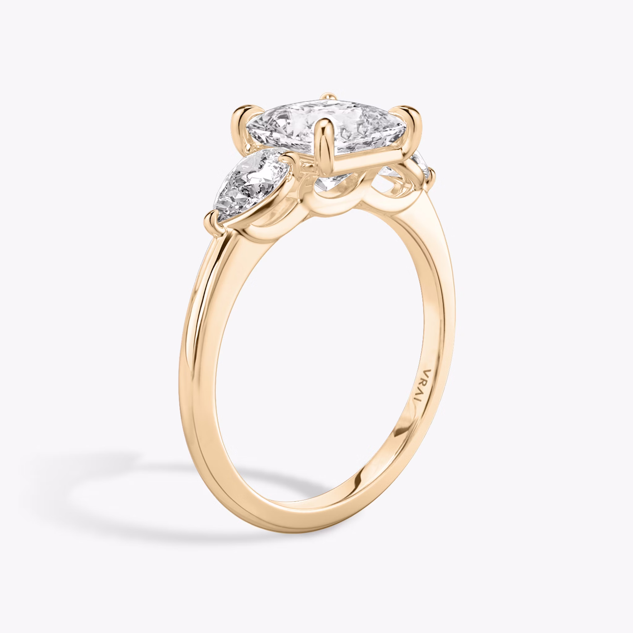 The Three Stone | Princess | 14k | Rose Gold | bandAccent: Plain | sideStoneCarat: 0.25ct | sideStoneShape: Pear | diamondOrientation: vertical | caratWeight: other