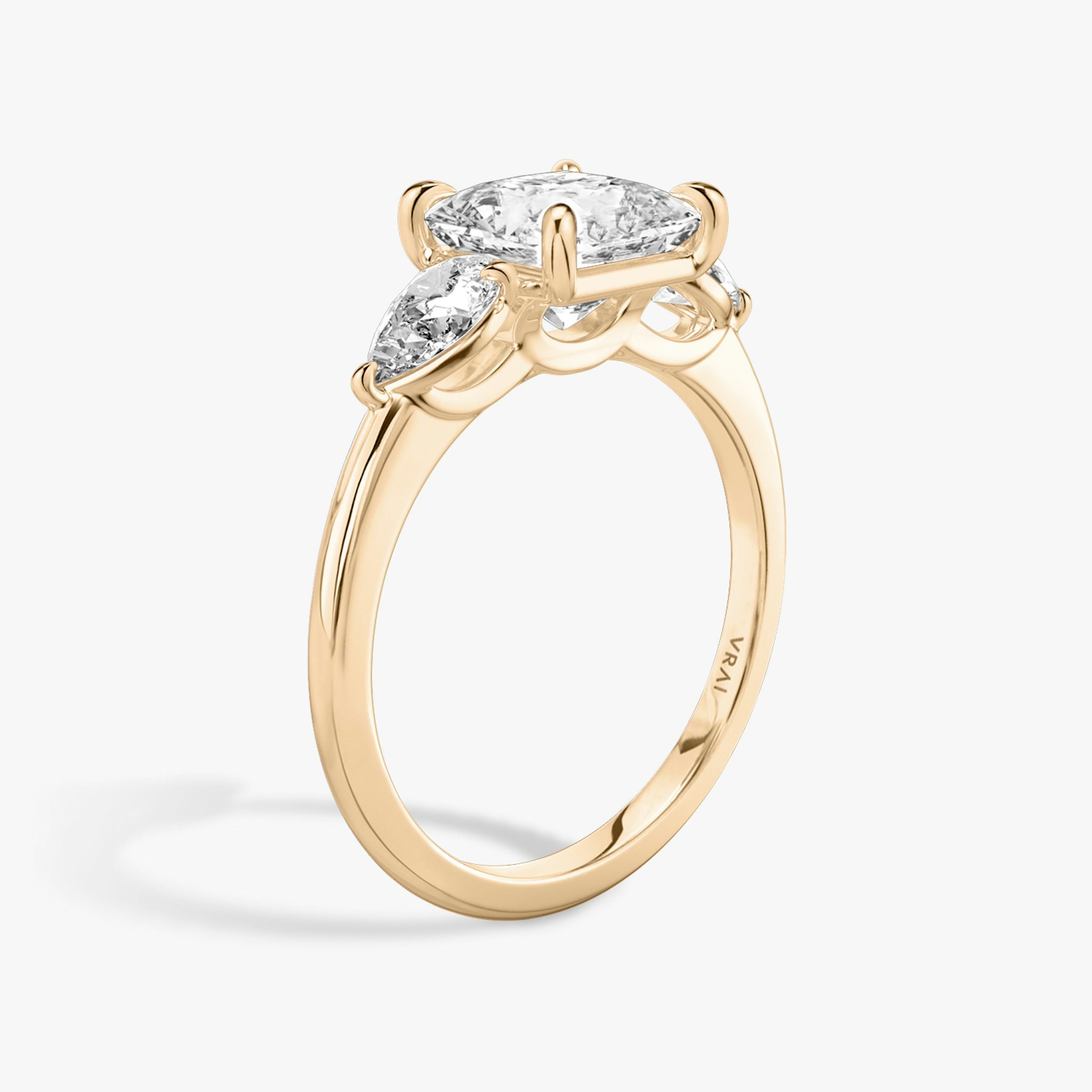 The Three Stone | Princess | 14k | Rose Gold | bandAccent: Plain | sideStoneCarat: 0.25ct | sideStoneShape: Pear | diamondOrientation: vertical | caratWeight: other