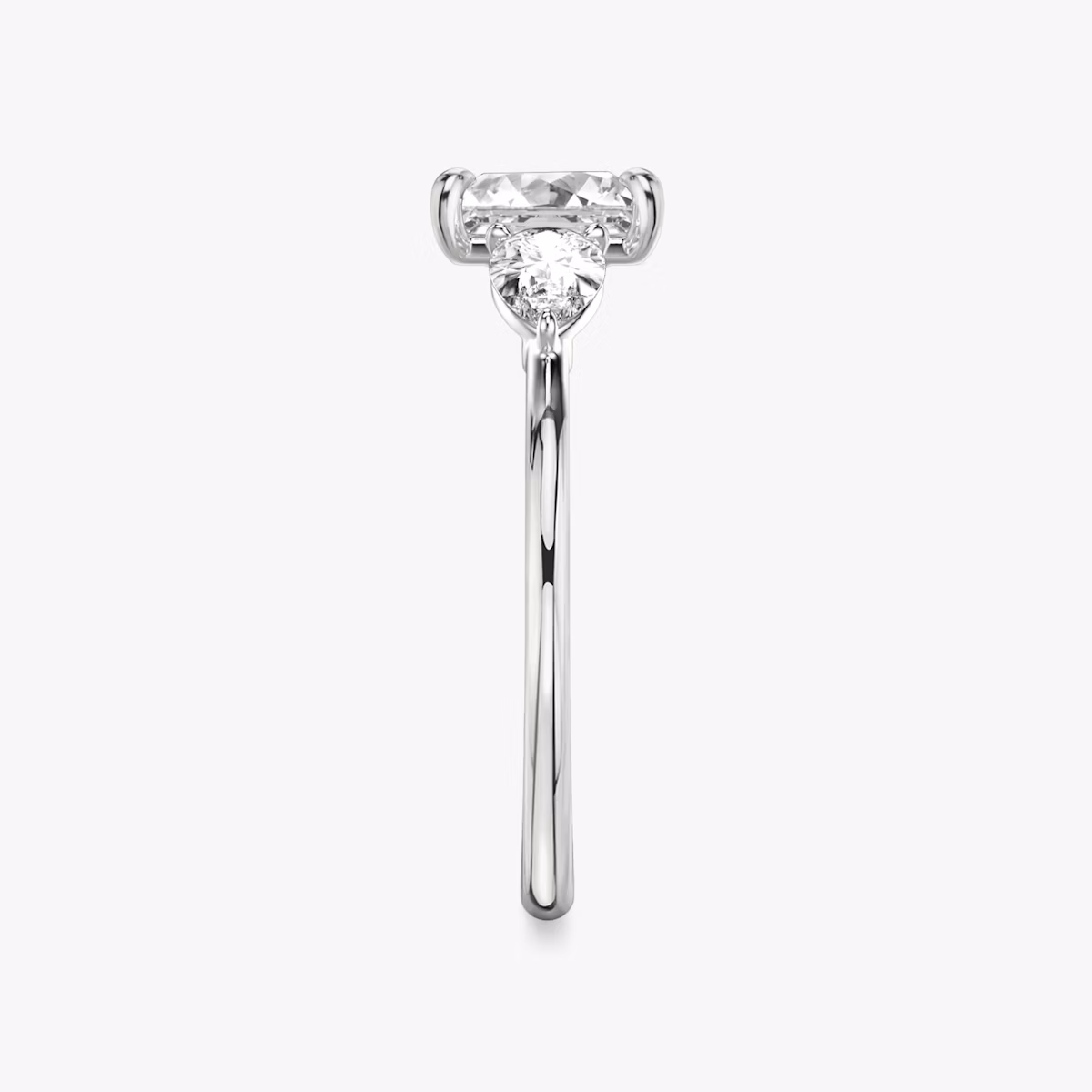 The Three Stone | Princess | Platinum | bandAccent: Plain | sideStoneCarat: 0.25ct | sideStoneShape: Pear | diamondOrientation: vertical | caratWeight: other