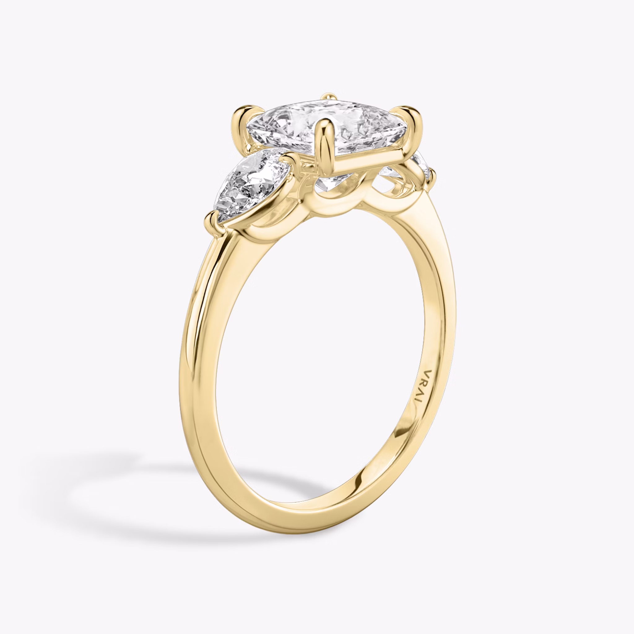 The Three Stone | Princess | 18k | Yellow Gold | bandAccent: Plain | sideStoneCarat: 0.25ct | sideStoneShape: Pear | diamondOrientation: vertical | caratWeight: other