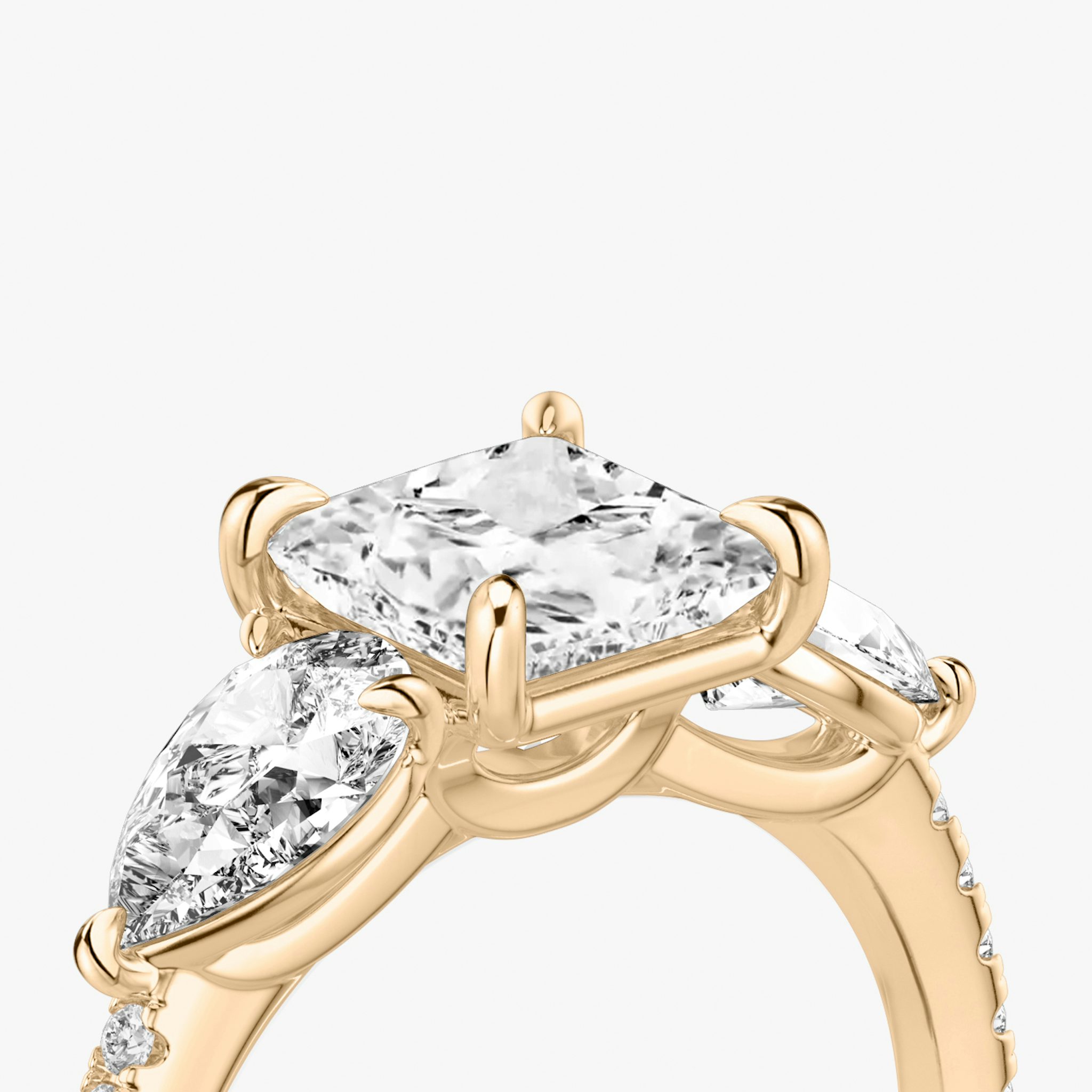 The Three Stone | Princess | 14k | Rose Gold | bandAccent: Pavé | sideStoneCarat: 0.50ct | sideStoneShape: Pear | diamondOrientation: vertical | caratWeight: other