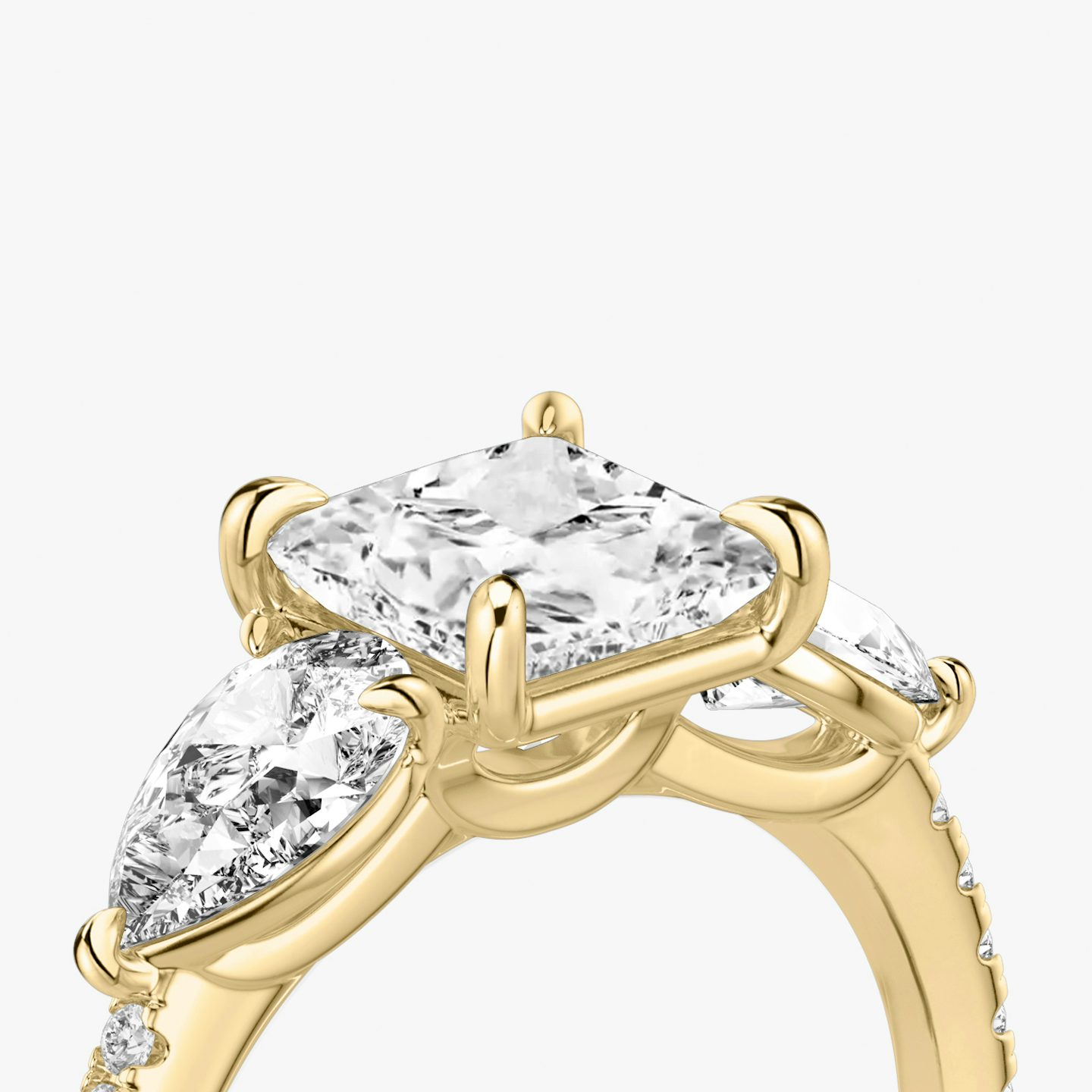 The Three Stone | Princess | 18k | Yellow Gold | bandAccent: Pavé | sideStoneCarat: 0.50ct | sideStoneShape: Pear | diamondOrientation: vertical | caratWeight: other
