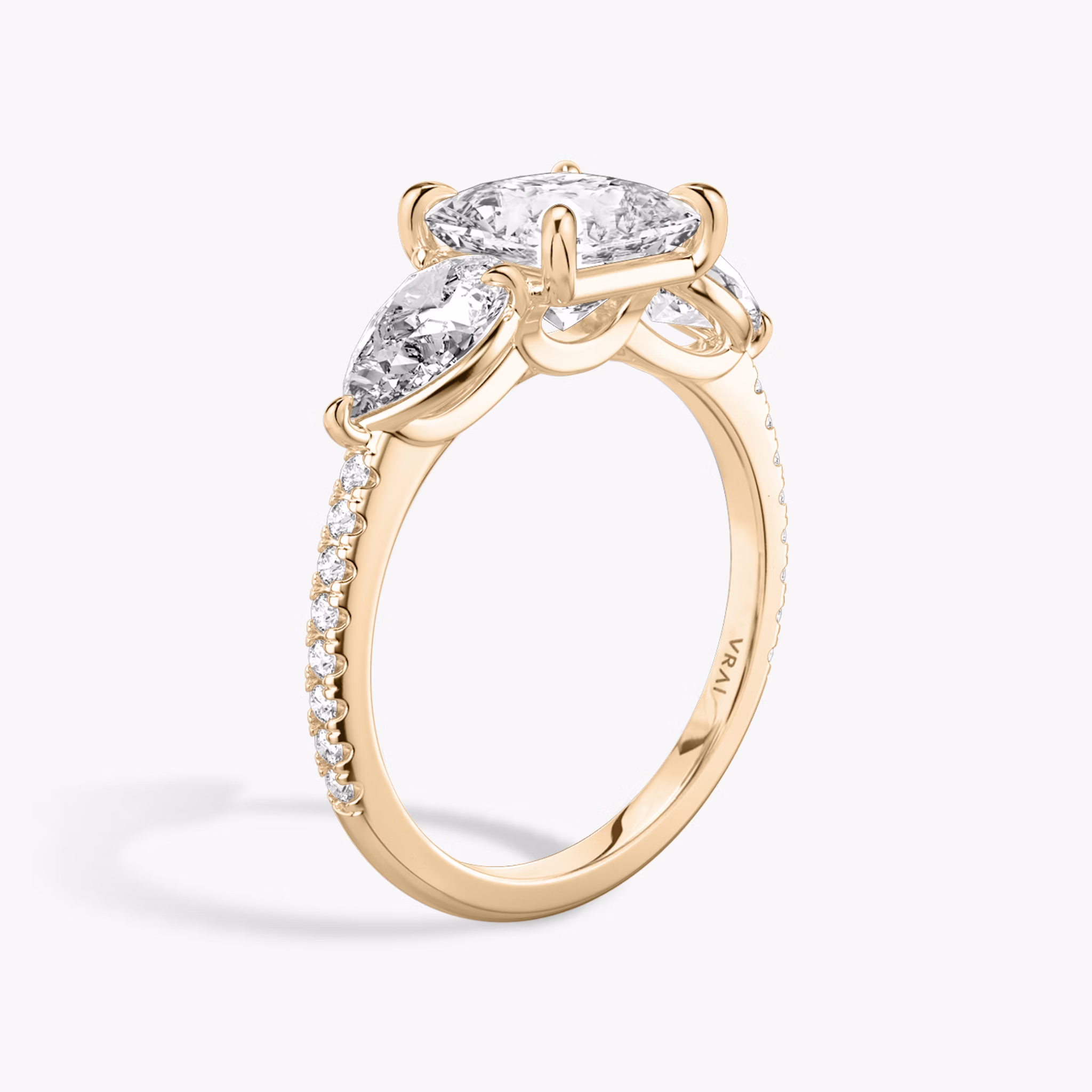 The Three Stone | Princess | 14k | Rose Gold | bandAccent: Pavé | sideStoneCarat: 0.50ct | sideStoneShape: Pear | diamondOrientation: vertical | caratWeight: other