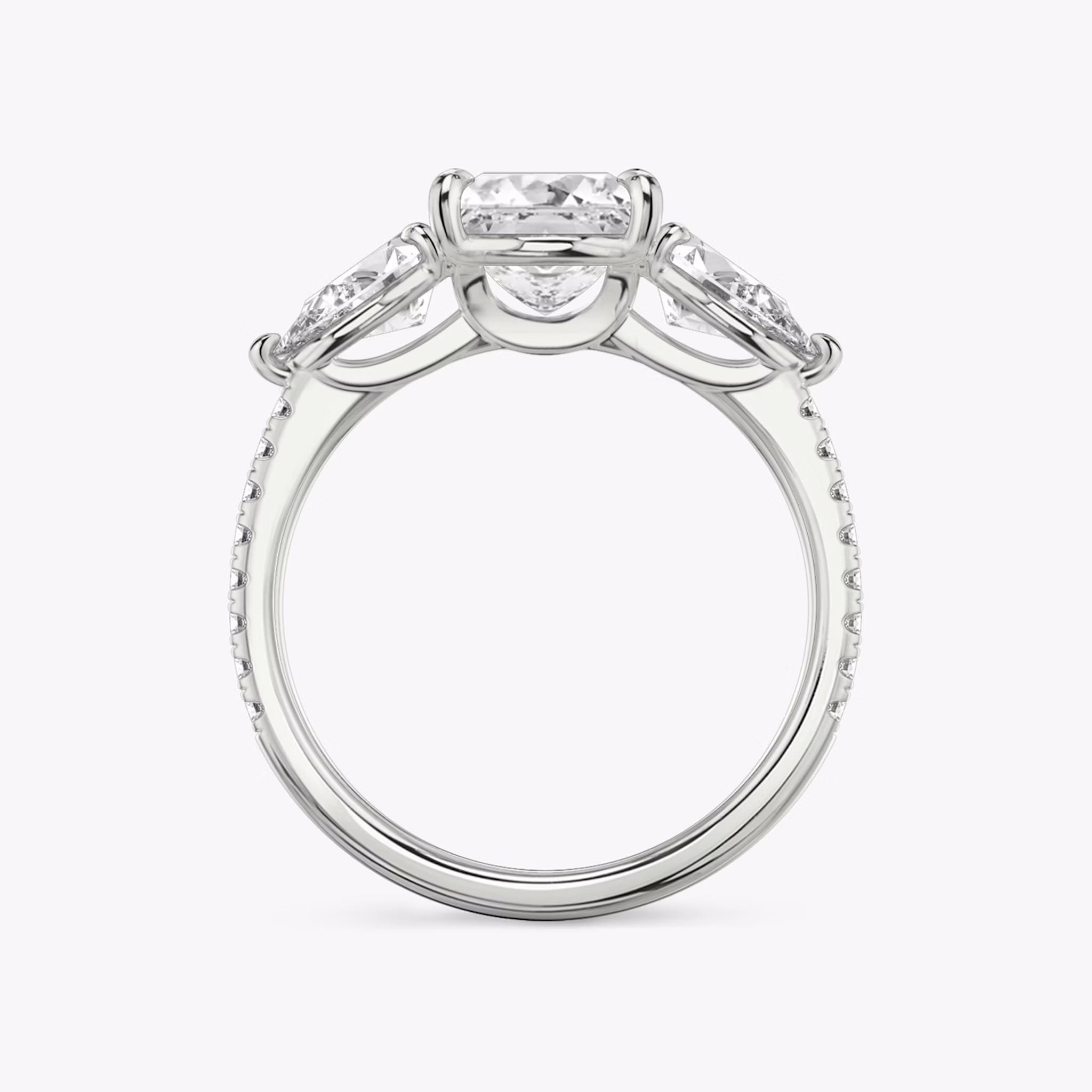 The Three Stone | Princess | 18k | White Gold | bandAccent: Pavé | sideStoneCarat: 0.50ct | sideStoneShape: Pear | diamondOrientation: vertical | caratWeight: other