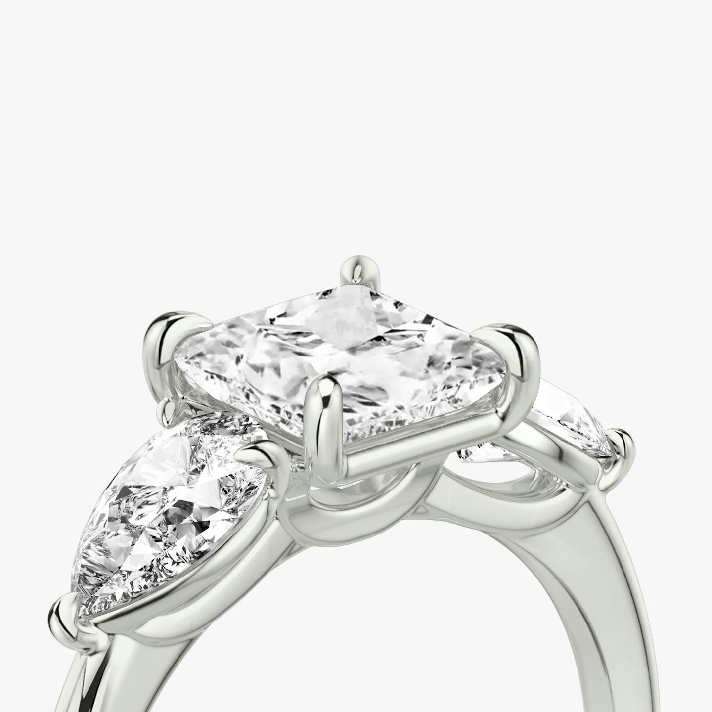 Three Stone | princess | platinum | bandAccent: plain | sideStoneCarat: 0.50ct | sideStoneShape: pear | diamondOrientation: vertical | caratWeight: other