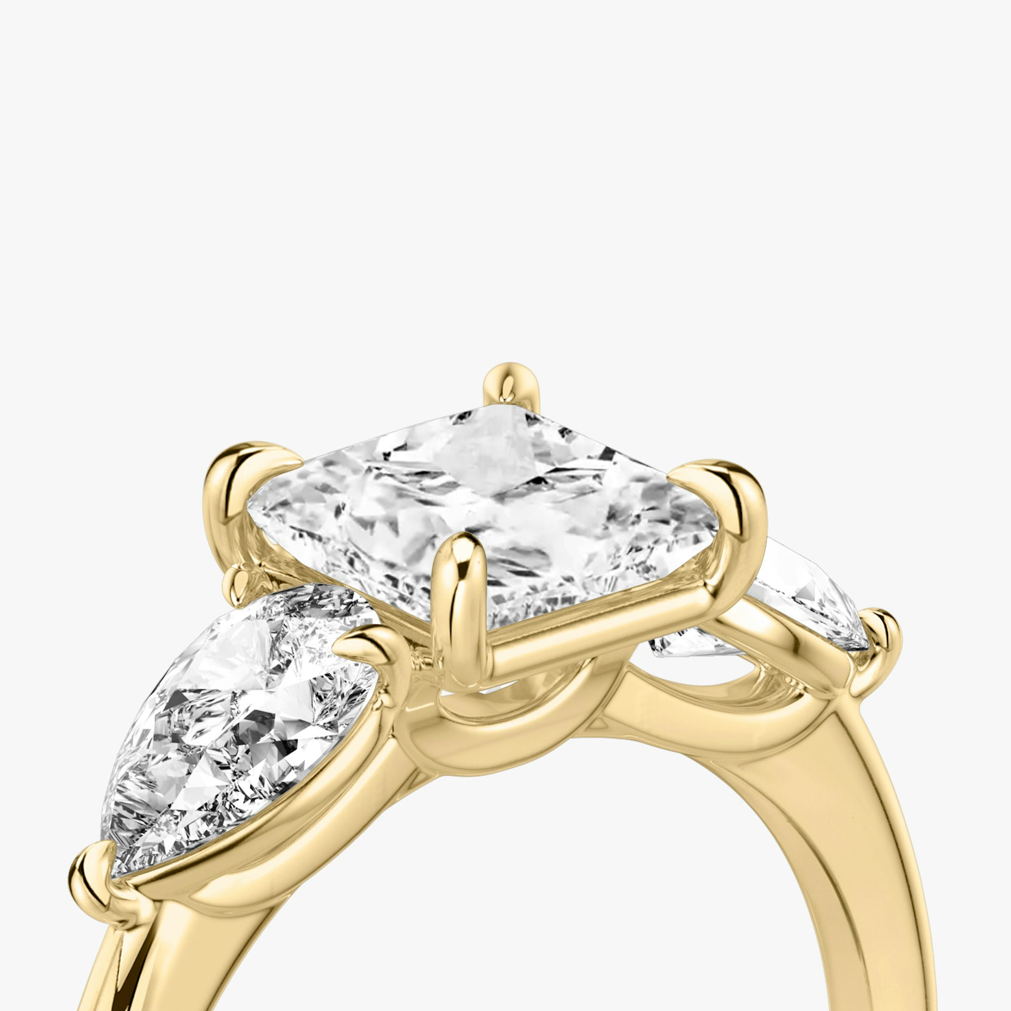 The Three Stone | Princess | 18k | Yellow Gold | bandAccent: Plain | sideStoneCarat: 0.50ct | sideStoneShape: Pear | diamondOrientation: vertical | caratWeight: other