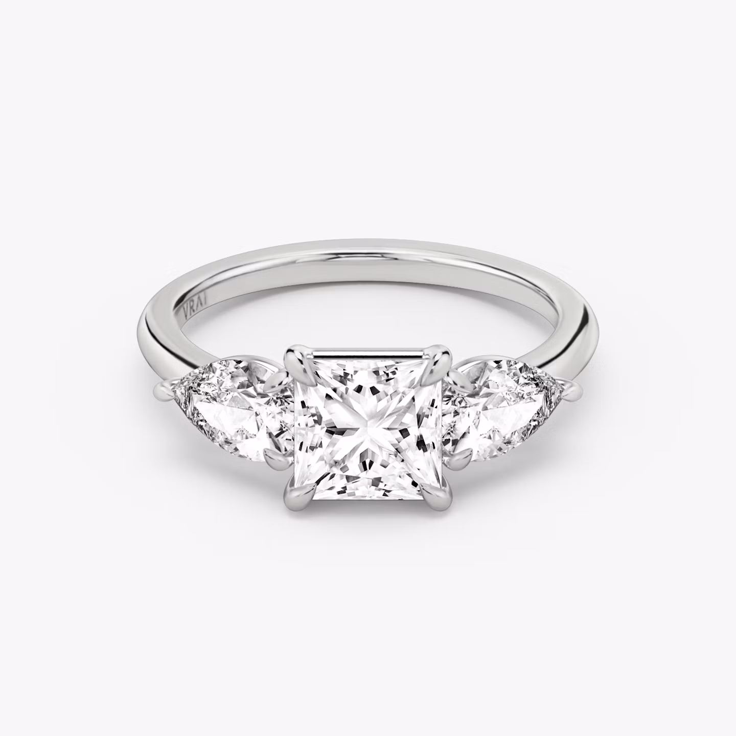 Three Stone | princess | platinum | bandAccent: plain | sideStoneCarat: 0.50ct | sideStoneShape: pear | diamondOrientation: vertical | caratWeight: other