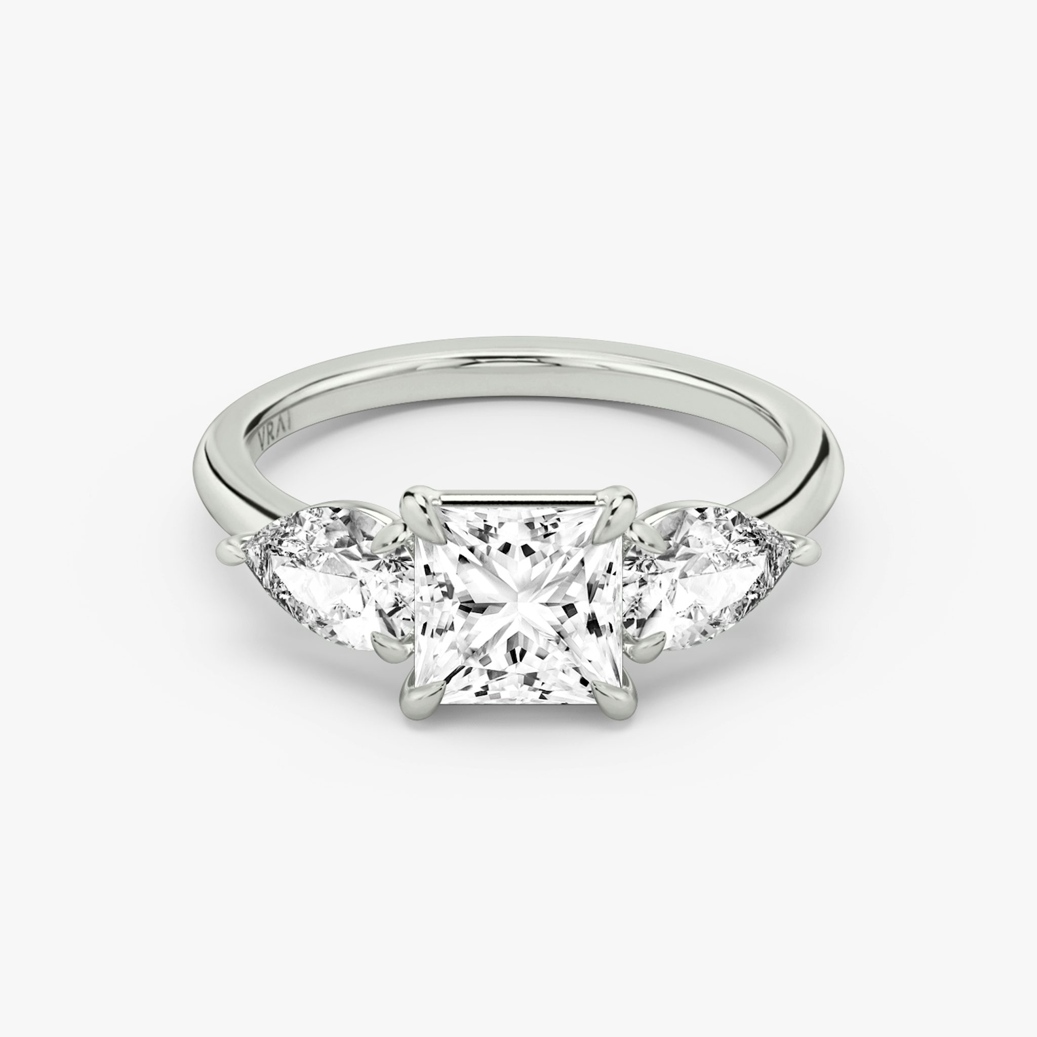 The Three Stone | Princess | 18k | White Gold | bandAccent: Plain | sideStoneCarat: 0.50ct | sideStoneShape: Pear | diamondOrientation: vertical | caratWeight: other