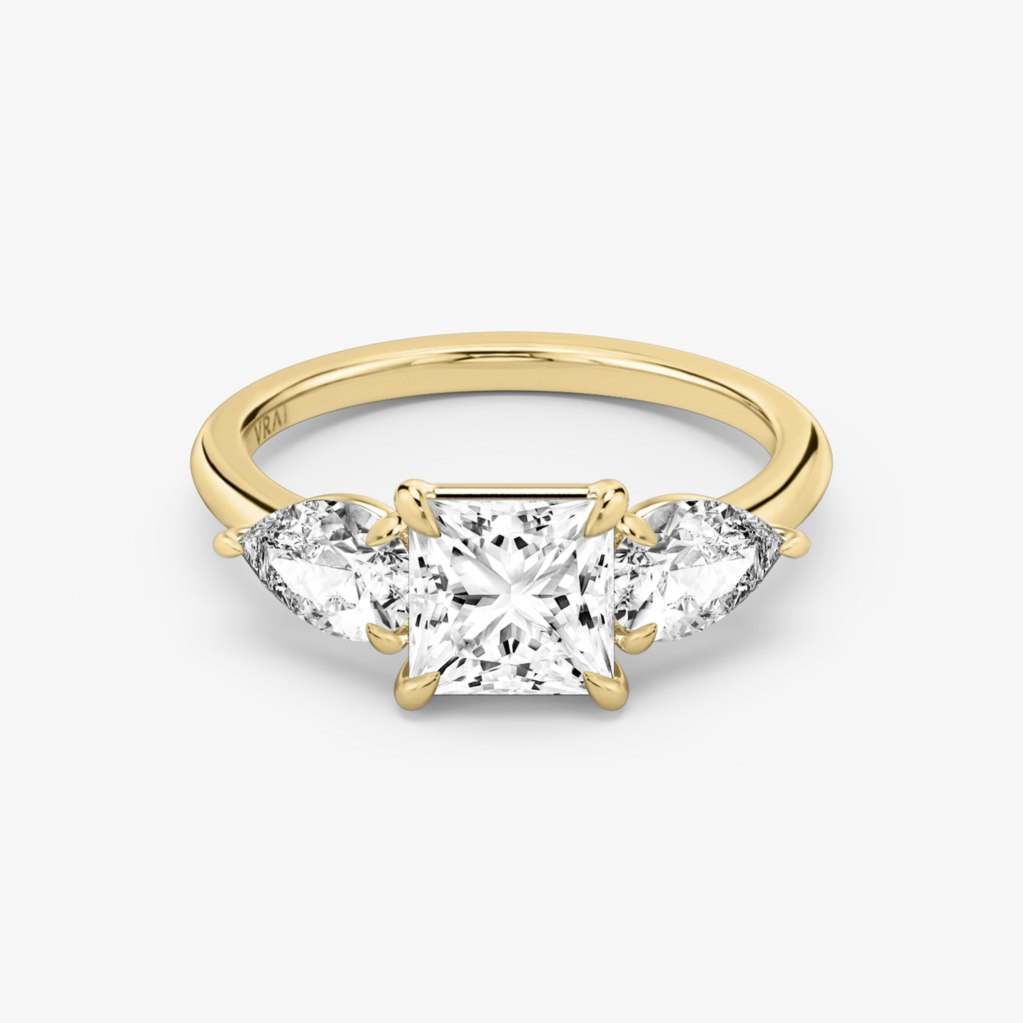 The Three Stone | Princess | 18k | Yellow Gold | bandAccent: Plain | sideStoneCarat: 0.50ct | sideStoneShape: Pear | diamondOrientation: vertical | caratWeight: other