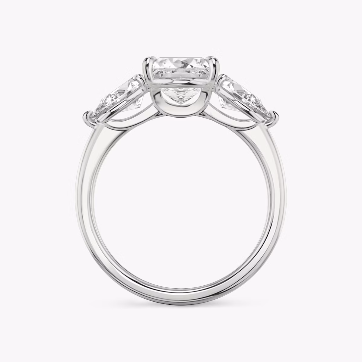 The Three Stone | Princess | Platinum | bandAccent: Plain | sideStoneCarat: 0.50ct | sideStoneShape: Pear | diamondOrientation: vertical | caratWeight: other