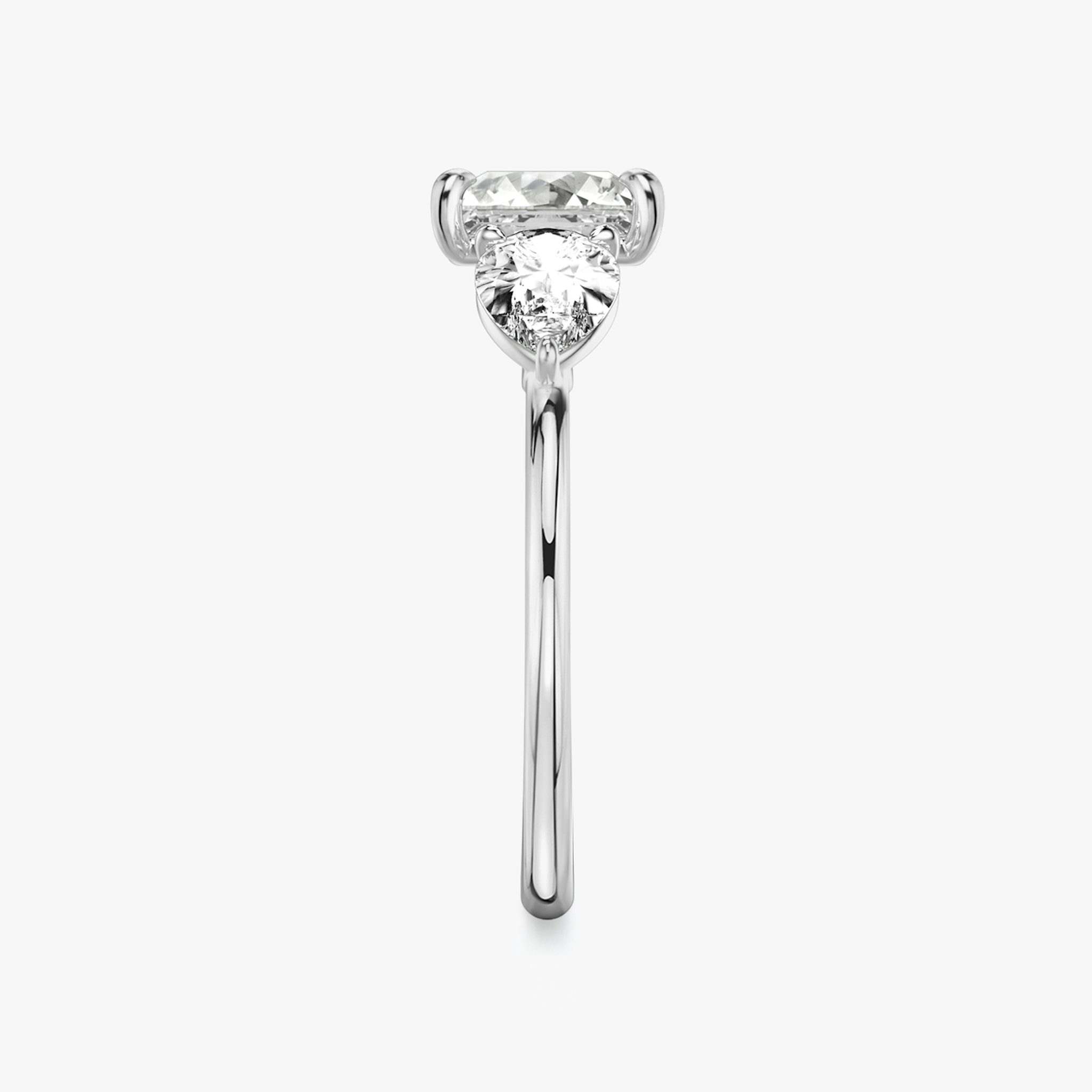 The Three Stone | Princess | 18k | White Gold | bandAccent: Plain | sideStoneCarat: 0.50ct | sideStoneShape: Pear | diamondOrientation: vertical | caratWeight: other