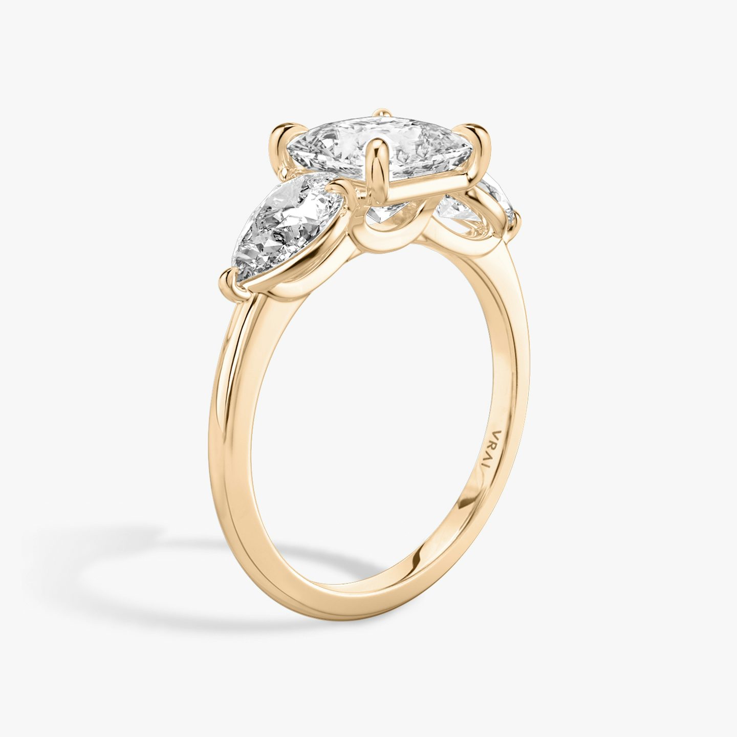 The Three Stone | Princess | 14k | Rose Gold | bandAccent: Plain | sideStoneCarat: 0.50ct | sideStoneShape: Pear | diamondOrientation: vertical | caratWeight: other