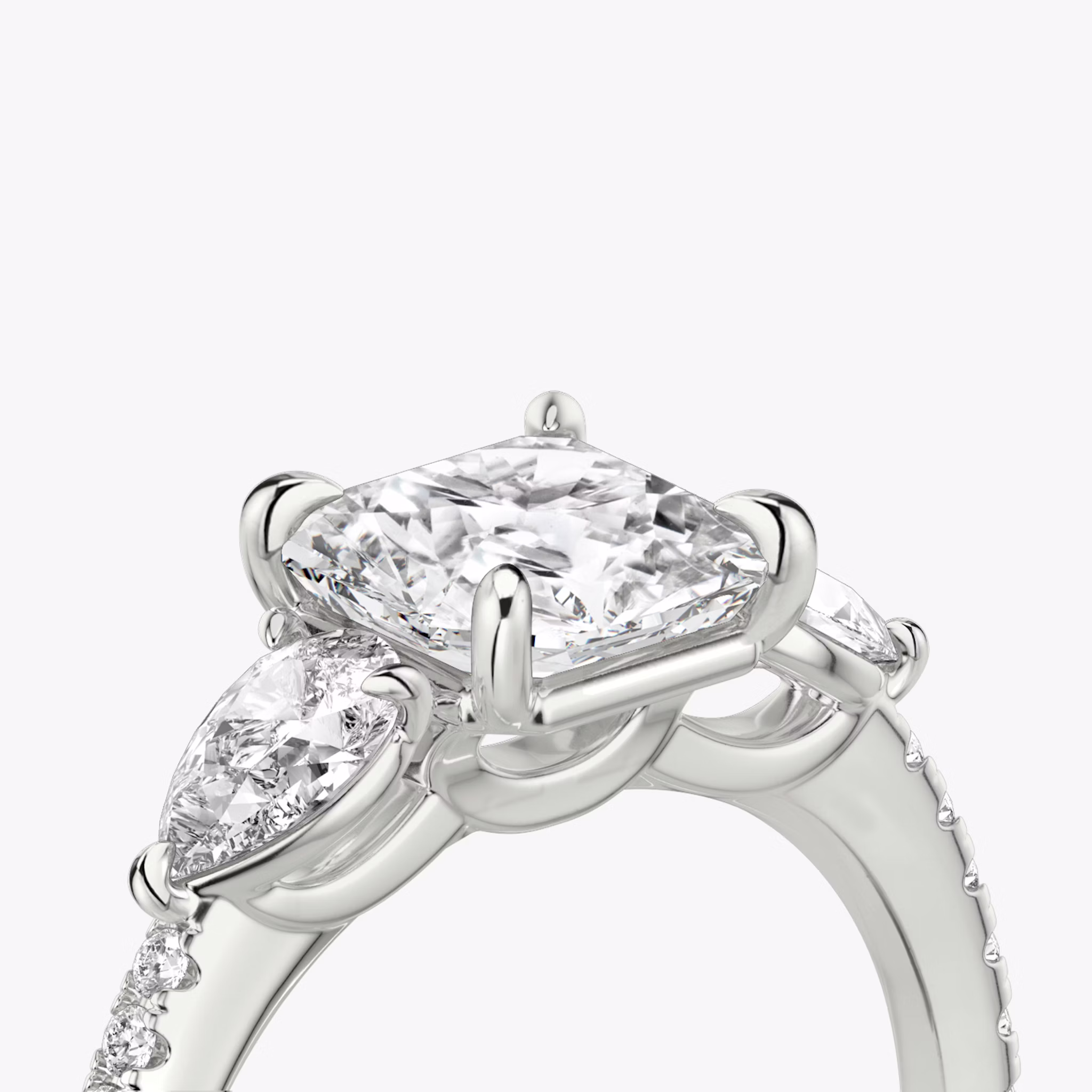 The Three Stone | Asscher | Platinum | bandAccent: Pavé | sideStoneCarat: 0.25ct | sideStoneShape: Pear | diamondOrientation: vertical | caratWeight: other