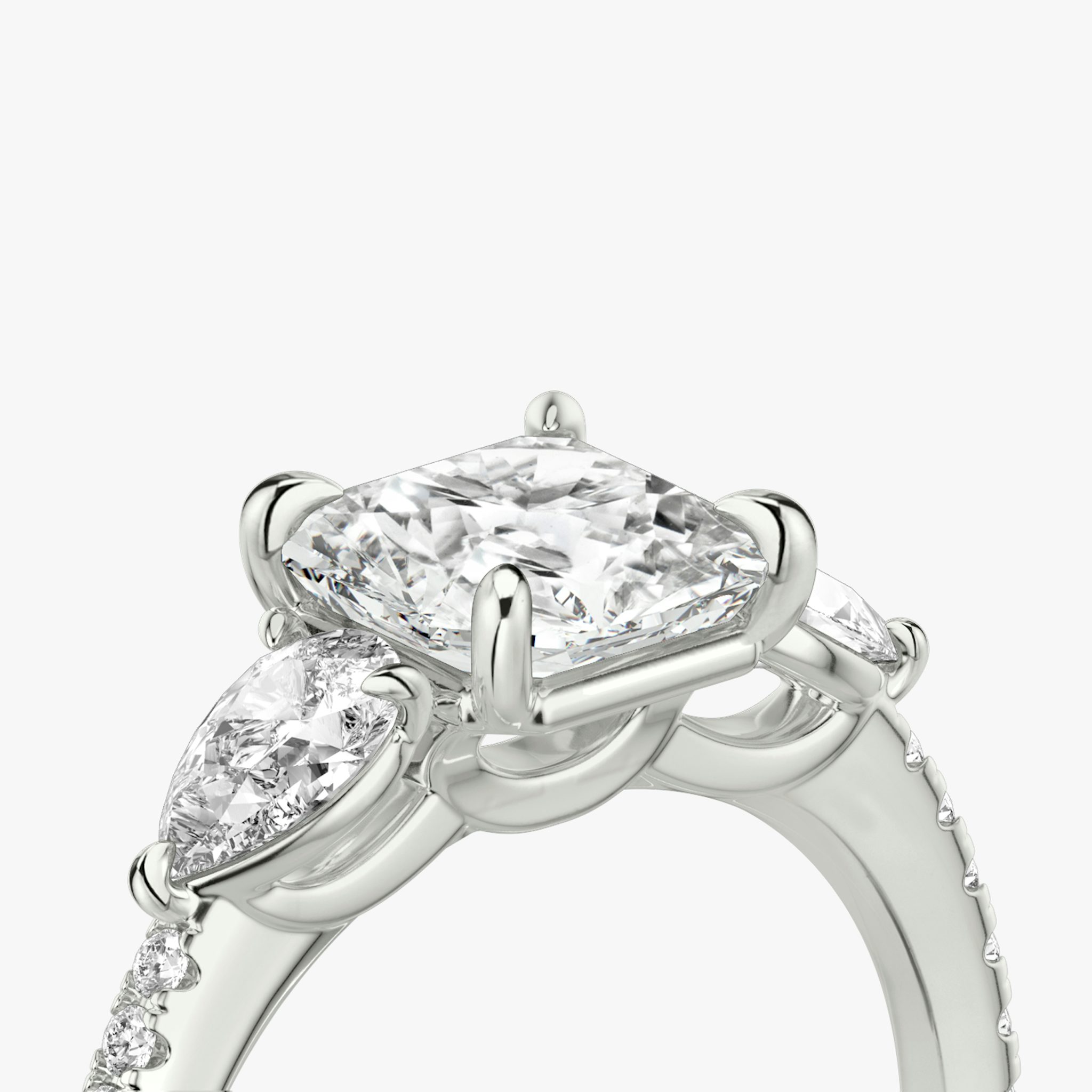 The Three Stone | Asscher | Platinum | bandAccent: Pavé | sideStoneCarat: 0.25ct | sideStoneShape: Pear | diamondOrientation: vertical | caratWeight: other