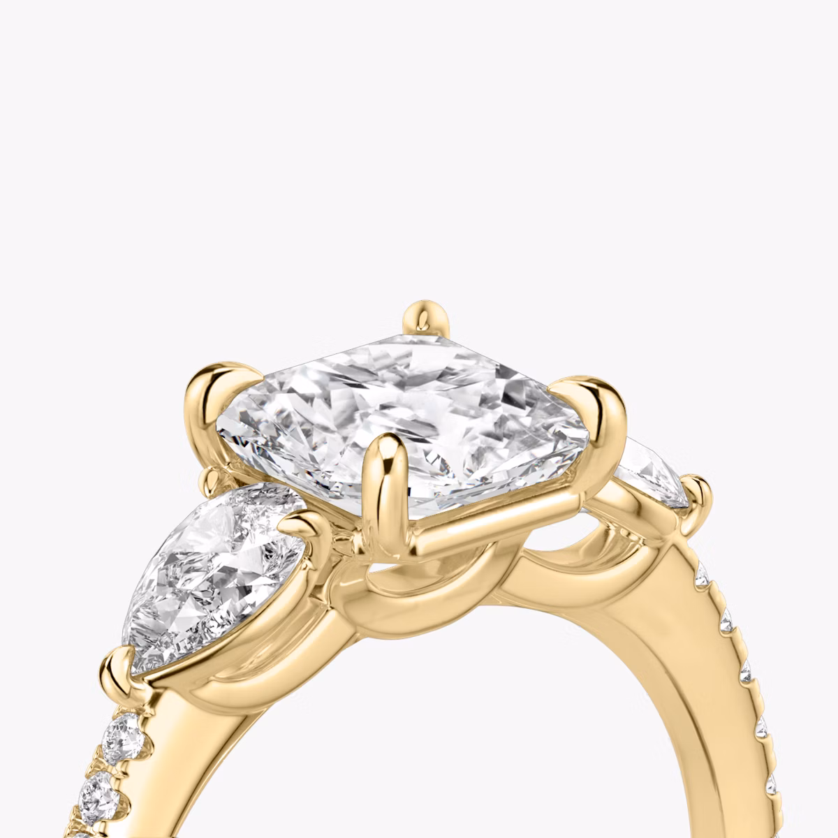 The Three Stone | Asscher | 18k | Yellow Gold | bandAccent: Pavé | sideStoneCarat: 0.25ct | sideStoneShape: Pear | diamondOrientation: vertical | caratWeight: other
