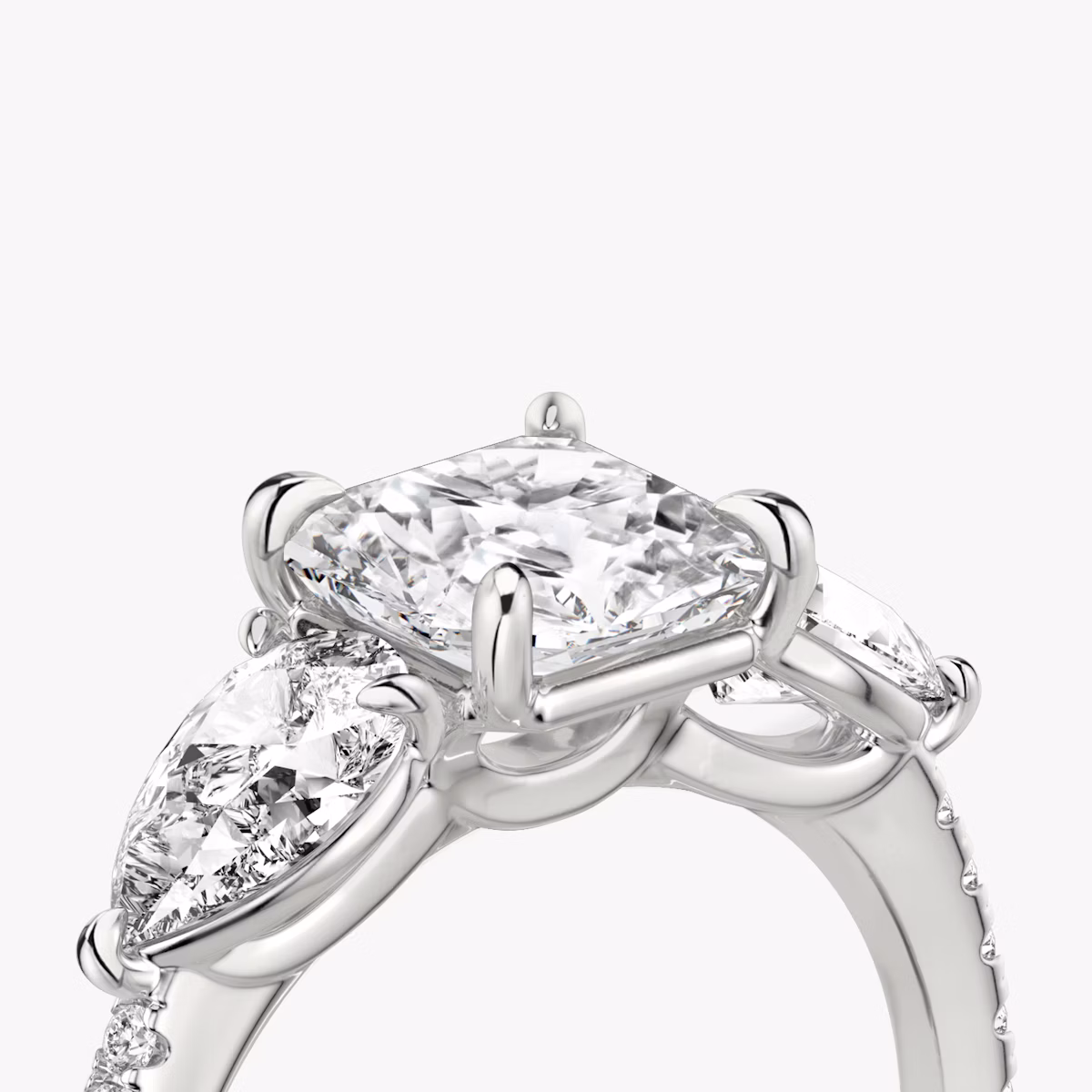 The Three Stone | Asscher | Platinum | bandAccent: Pavé | sideStoneCarat: 0.50ct | sideStoneShape: Pear | diamondOrientation: vertical | caratWeight: other