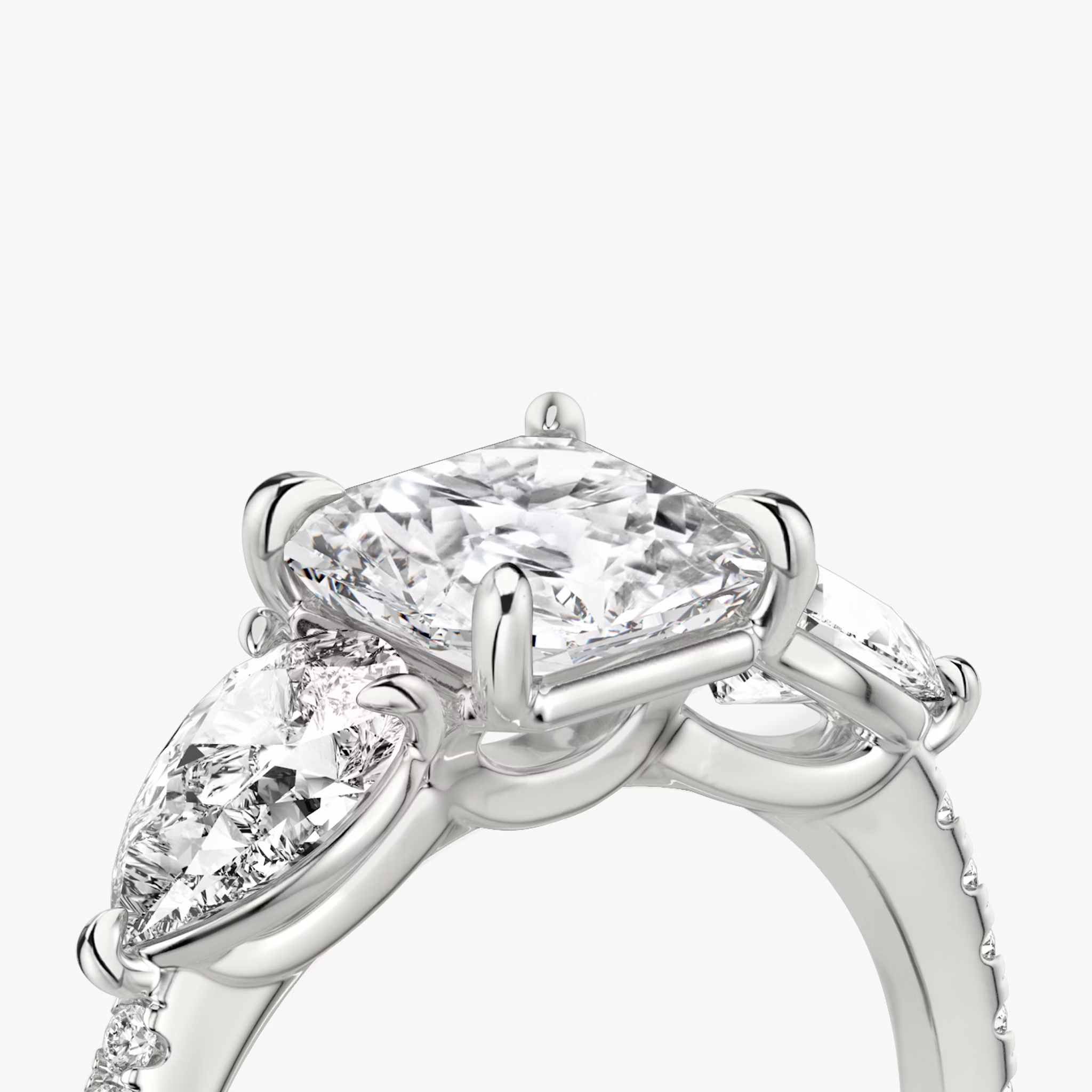 The Three Stone | Asscher | 18k | White Gold | bandAccent: Pavé | sideStoneCarat: 0.50ct | sideStoneShape: Pear | diamondOrientation: vertical | caratWeight: other