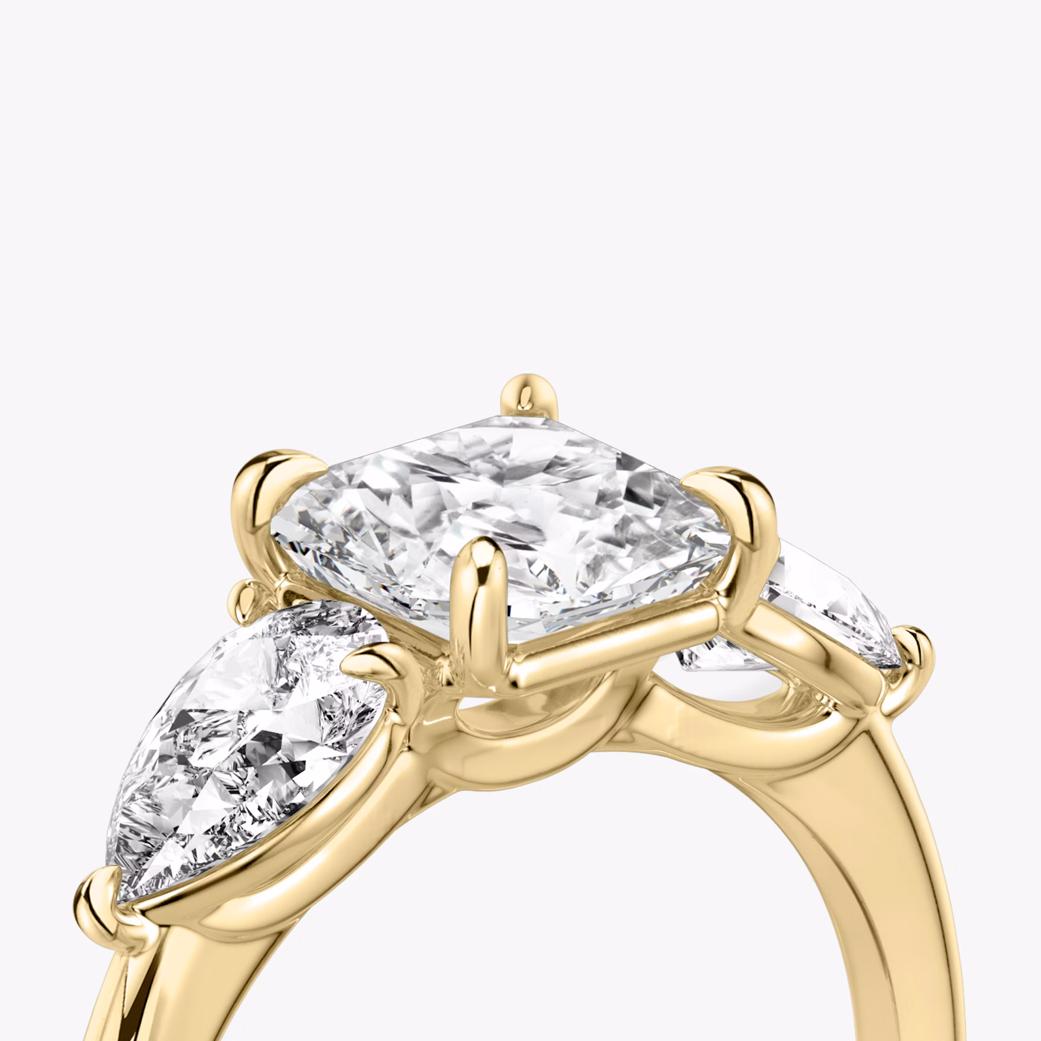 The Three Stone | Asscher | 18k | Yellow Gold | bandAccent: Plain | sideStoneCarat: 0.50ct | sideStoneShape: Pear | diamondOrientation: vertical | caratWeight: other