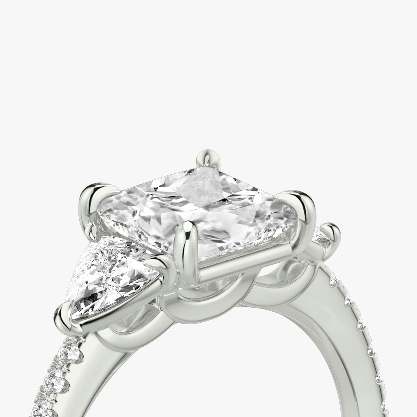 The Three Stone | Princess | Platinum | bandAccent: Pavé | sideStoneCarat: 0.25ct | sideStoneShape: Trillion | diamondOrientation: vertical | caratWeight: other