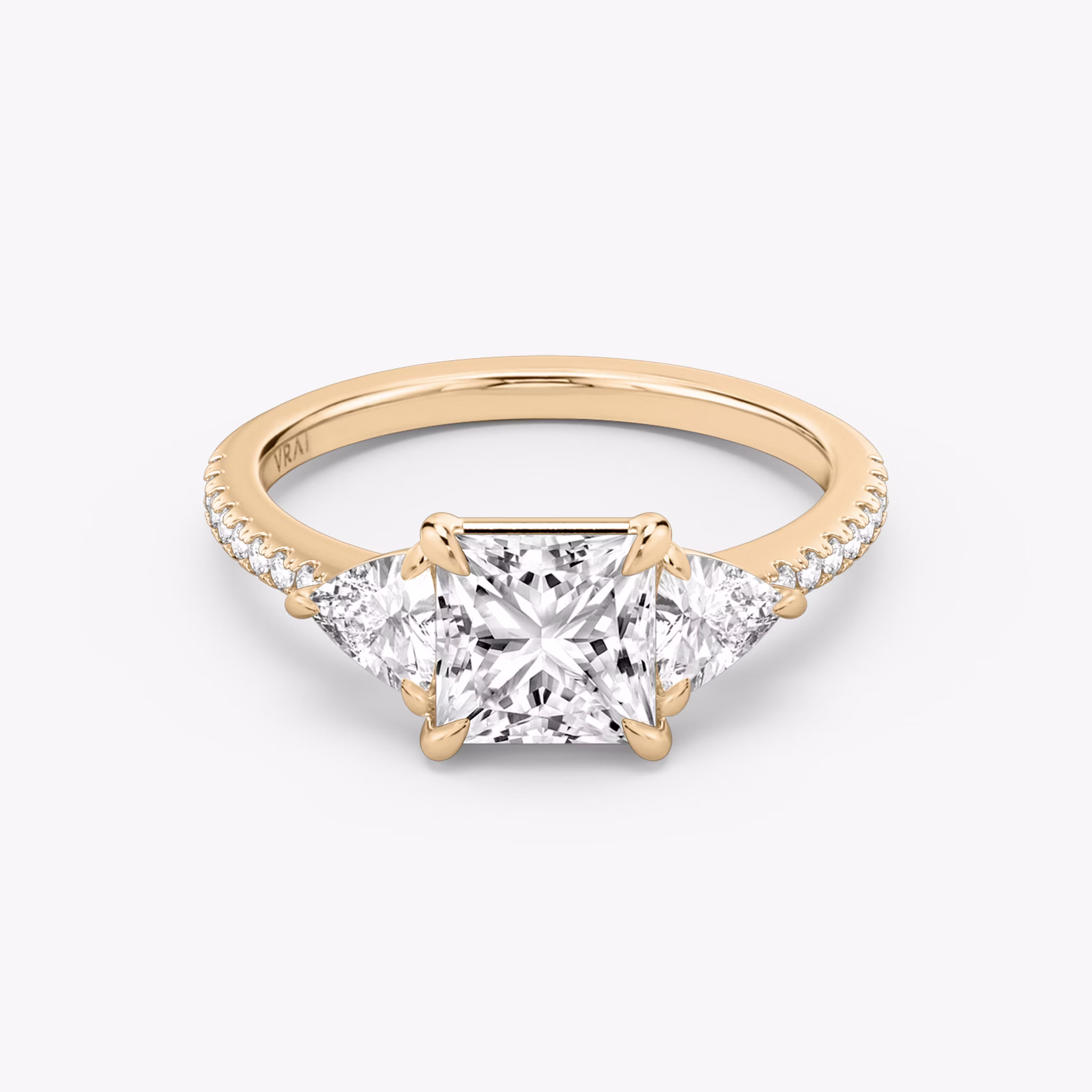 The Three Stone | Princess | 14k | Rose Gold | bandAccent: Pavé | sideStoneCarat: 0.25ct | sideStoneShape: Trillion | diamondOrientation: vertical | caratWeight: other