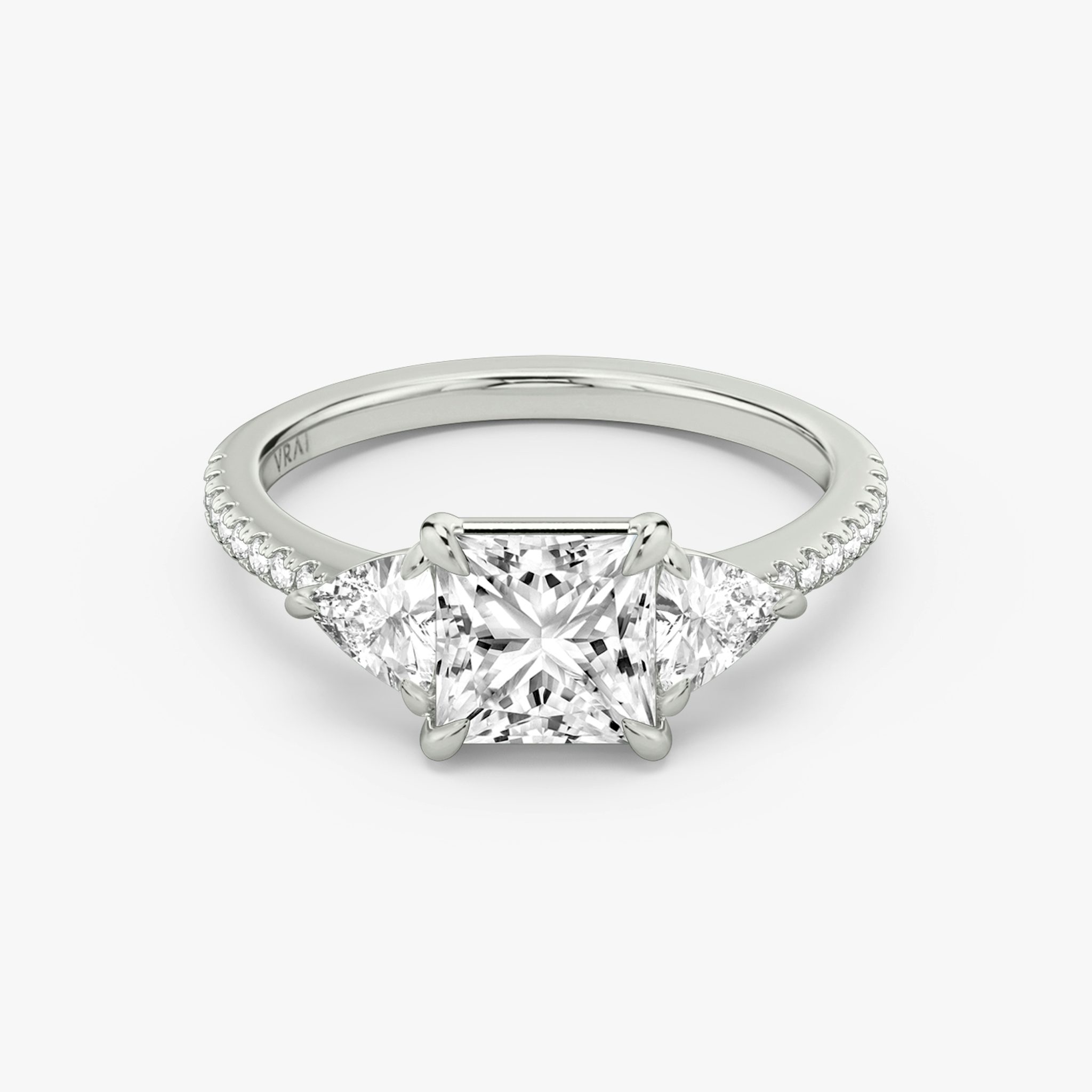 The Three Stone | Princess | 18k | White Gold | bandAccent: Pavé | sideStoneCarat: 0.25ct | sideStoneShape: Trillion | diamondOrientation: vertical | caratWeight: other