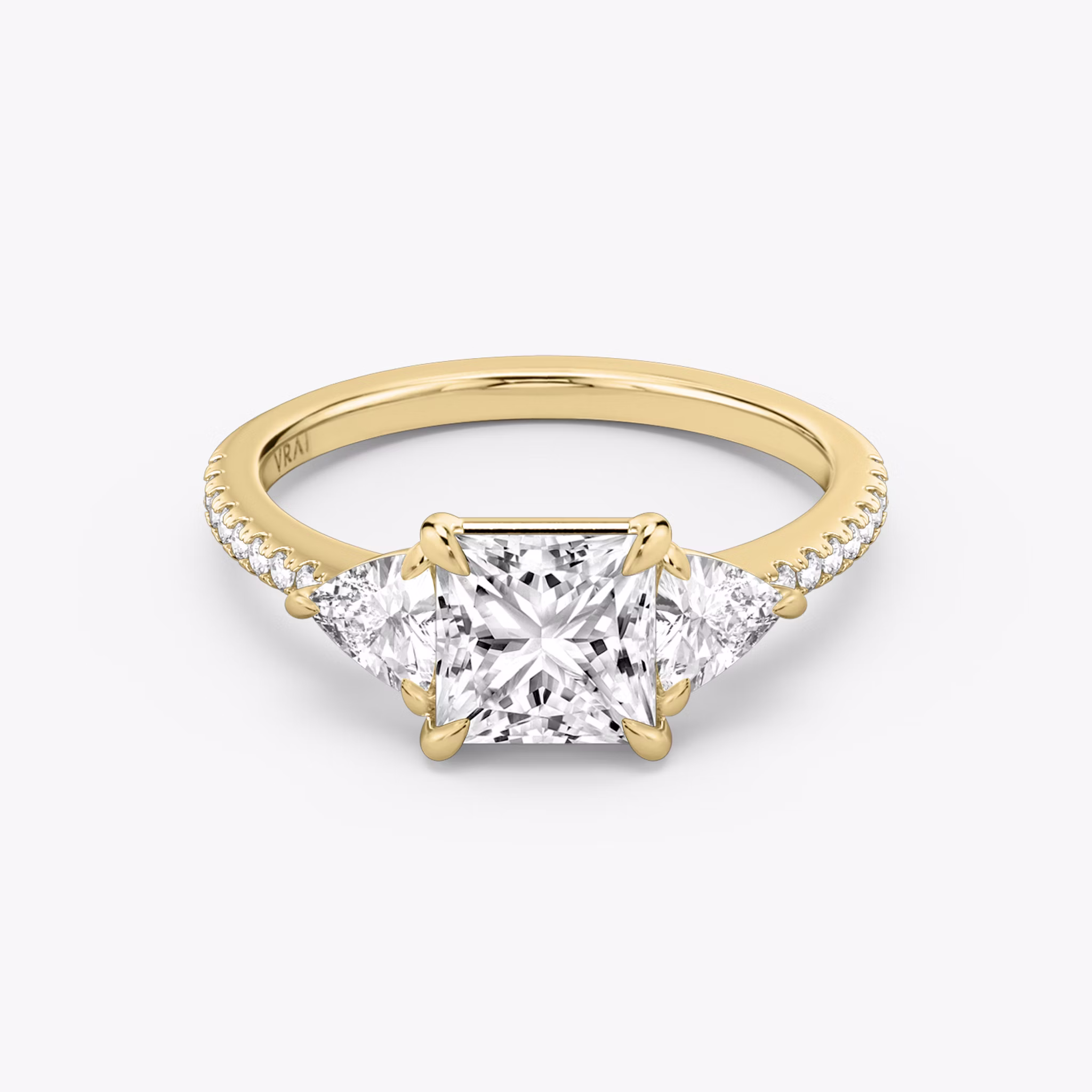 The Three Stone | Princess | 18k | Yellow Gold | bandAccent: Pavé | sideStoneCarat: 0.25ct | sideStoneShape: Trillion | diamondOrientation: vertical | caratWeight: other