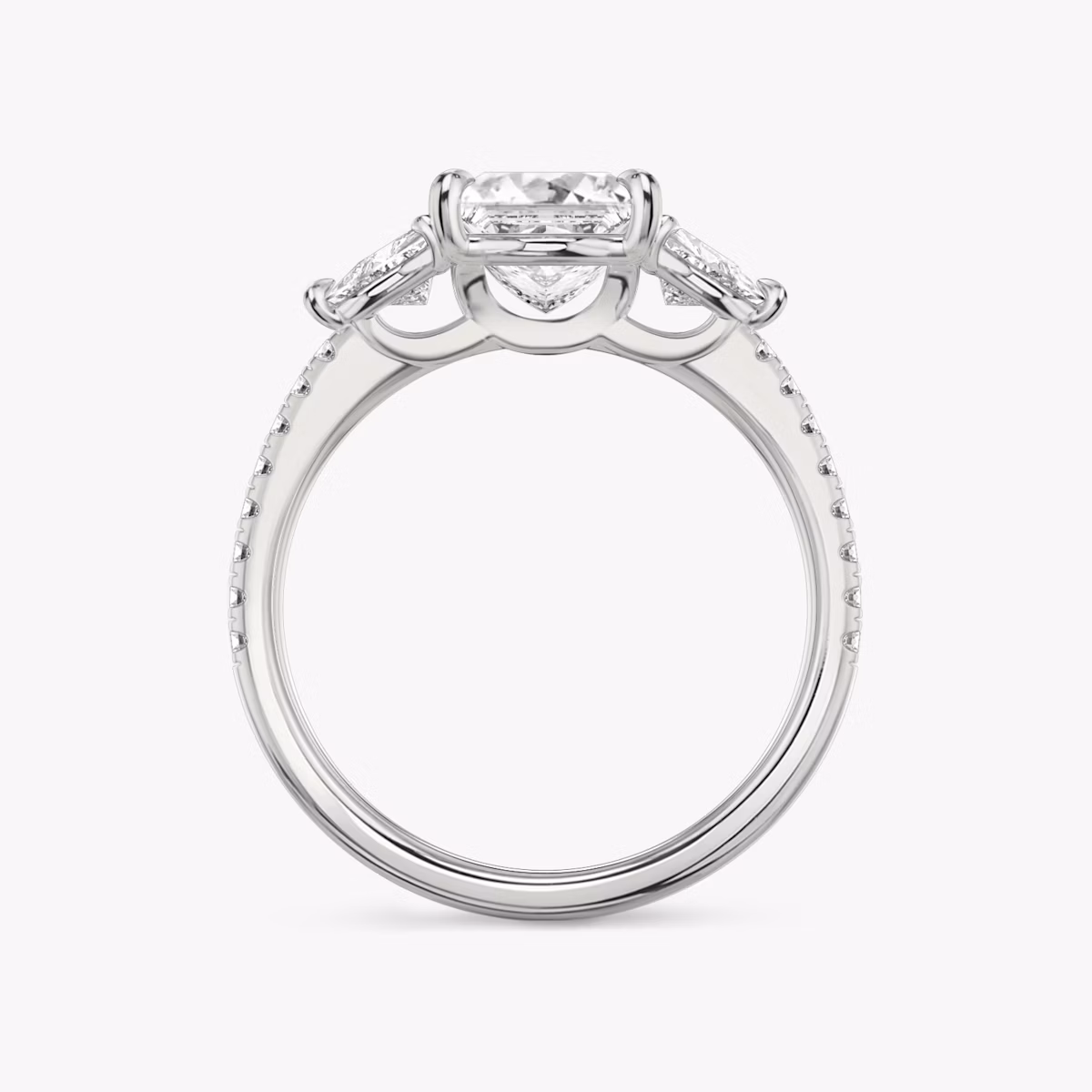 The Three Stone | Princess | Platinum | bandAccent: Pavé | sideStoneCarat: 0.25ct | sideStoneShape: Trillion | diamondOrientation: vertical | caratWeight: other