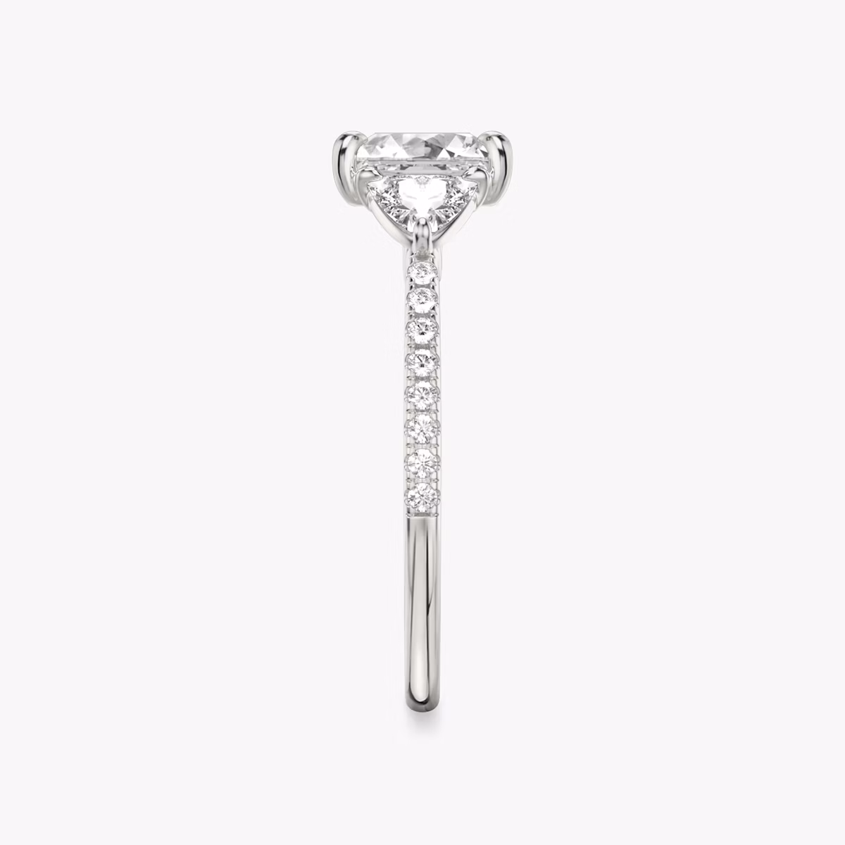 The Three Stone | Princess | Platinum | bandAccent: Pavé | sideStoneCarat: 0.25ct | sideStoneShape: Trillion | diamondOrientation: vertical | caratWeight: other