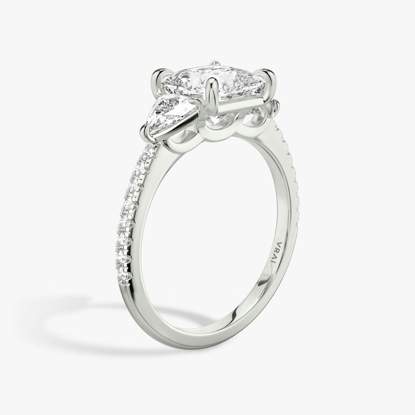 The Three Stone | Princess | Platinum | bandAccent: Pavé | sideStoneCarat: 0.25ct | sideStoneShape: Trillion | diamondOrientation: vertical | caratWeight: other