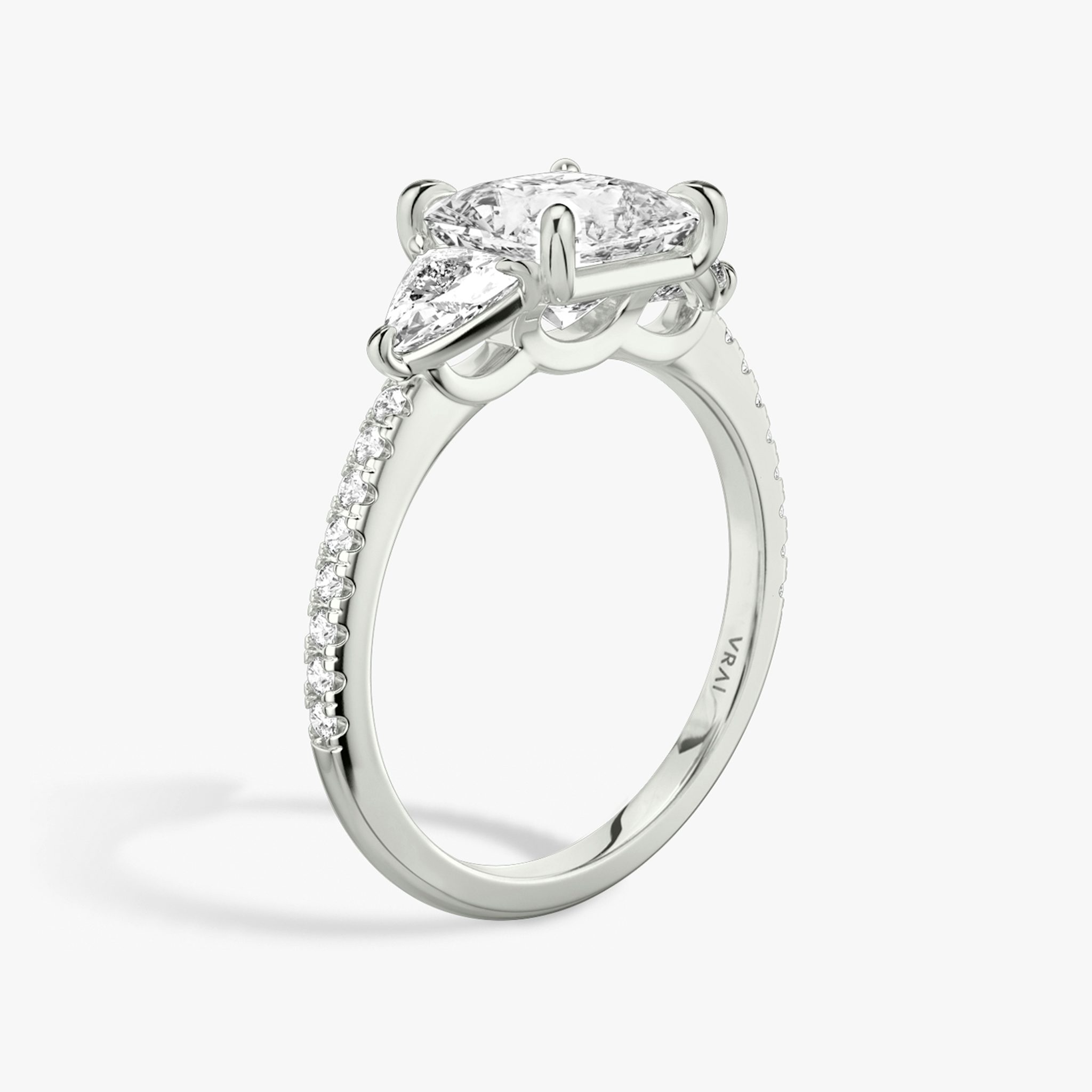 The Three Stone | Princess | 18k | White Gold | bandAccent: Pavé | sideStoneCarat: 0.25ct | sideStoneShape: Trillion | diamondOrientation: vertical | caratWeight: other