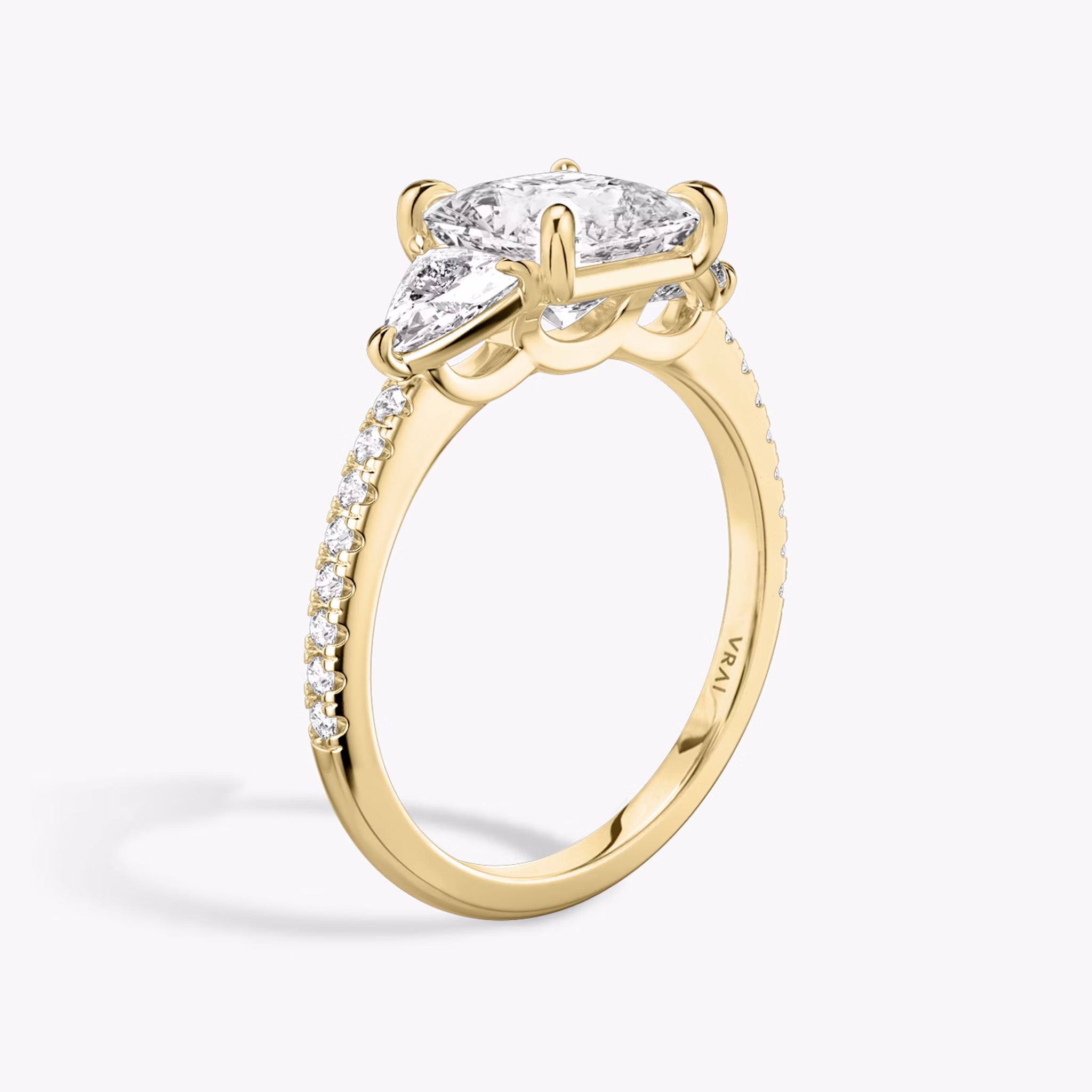 The Three Stone | Princess | 18k | Yellow Gold | bandAccent: Pavé | sideStoneCarat: 0.25ct | sideStoneShape: Trillion | diamondOrientation: vertical | caratWeight: other