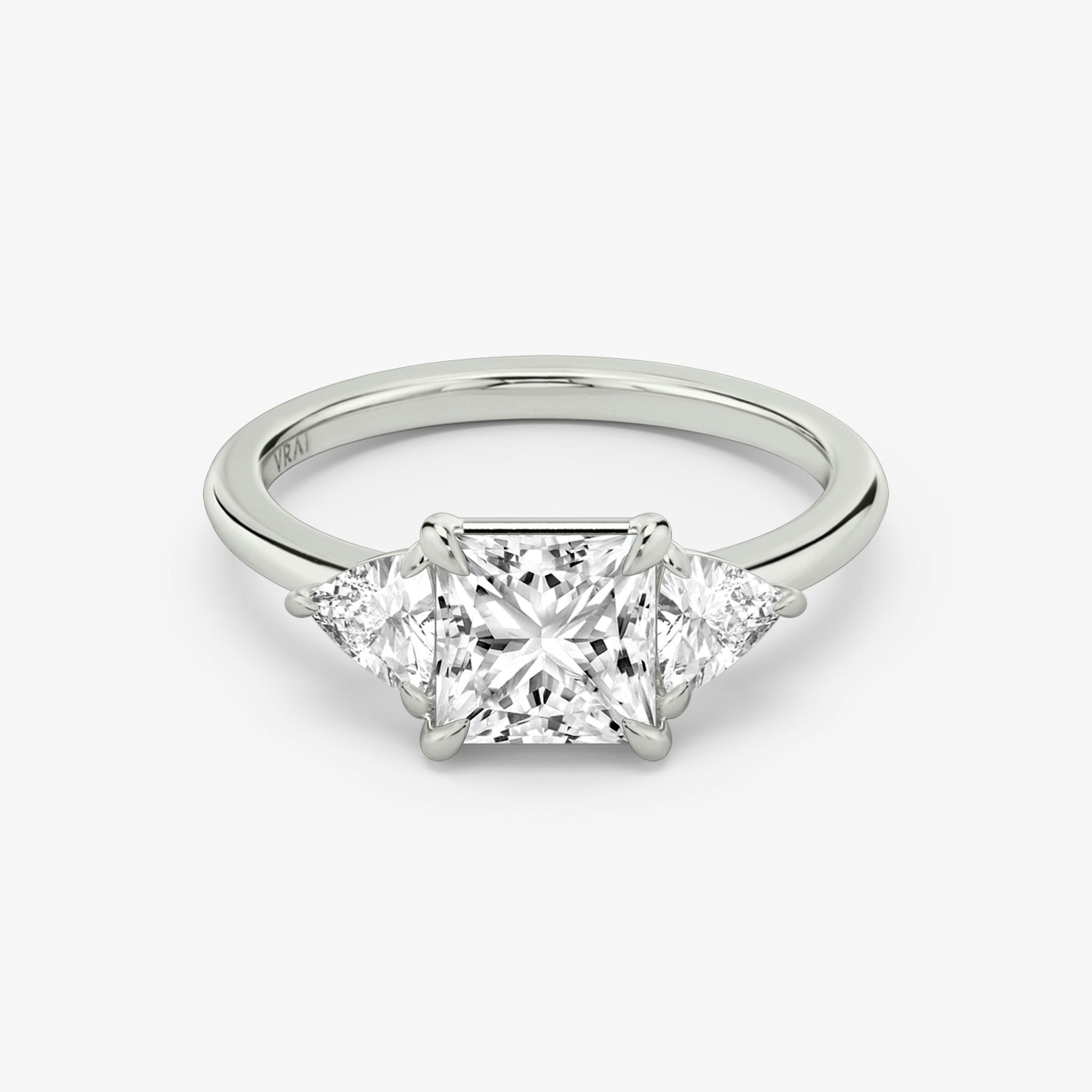 The Three Stone | Princess | 18k | White Gold | bandAccent: Plain | sideStoneCarat: 0.25ct | sideStoneShape: Trillion | diamondOrientation: vertical | caratWeight: other