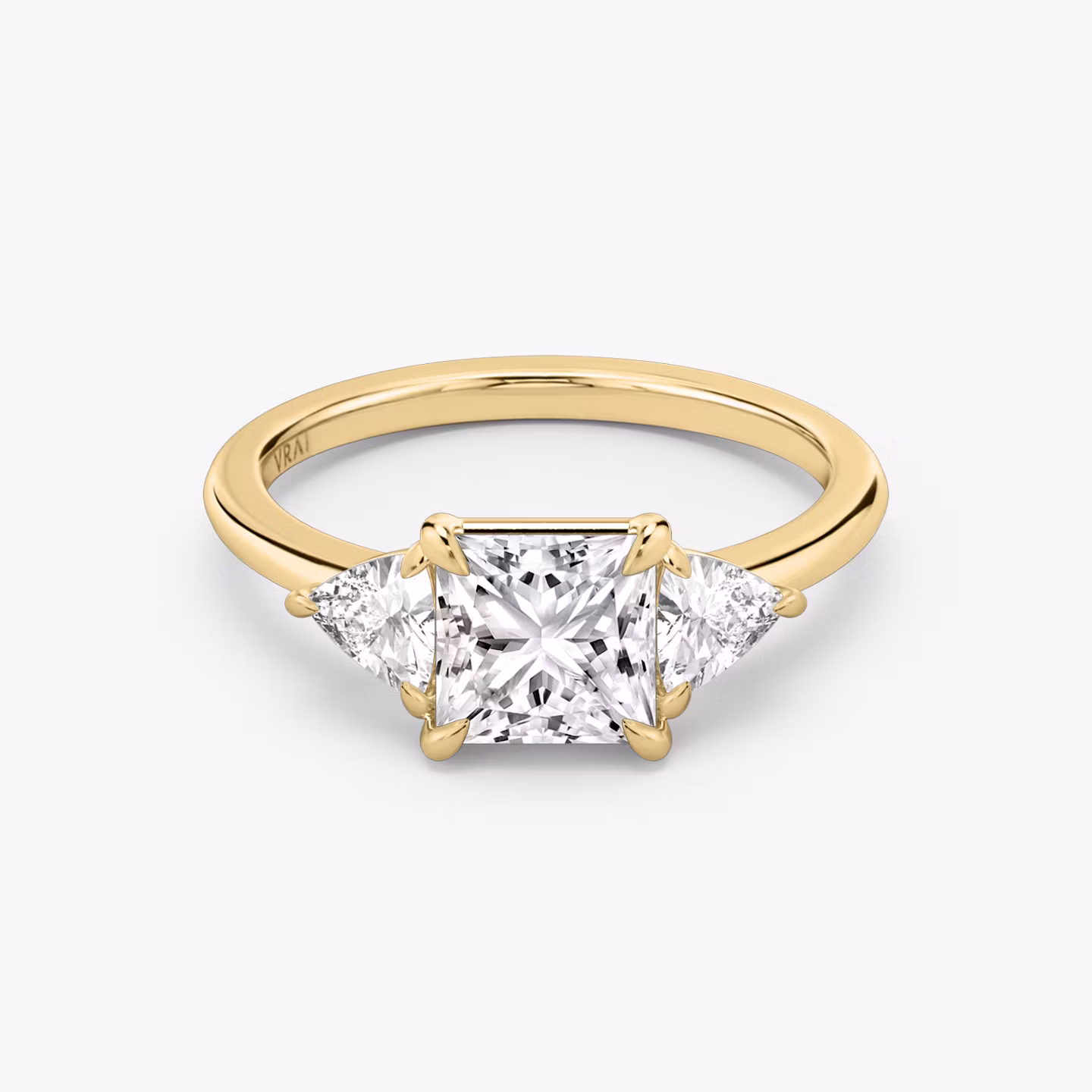 The Three Stone | Princess | 18k | Yellow Gold | bandAccent: Plain | sideStoneCarat: 0.25ct | sideStoneShape: Trillion | diamondOrientation: vertical | caratWeight: other