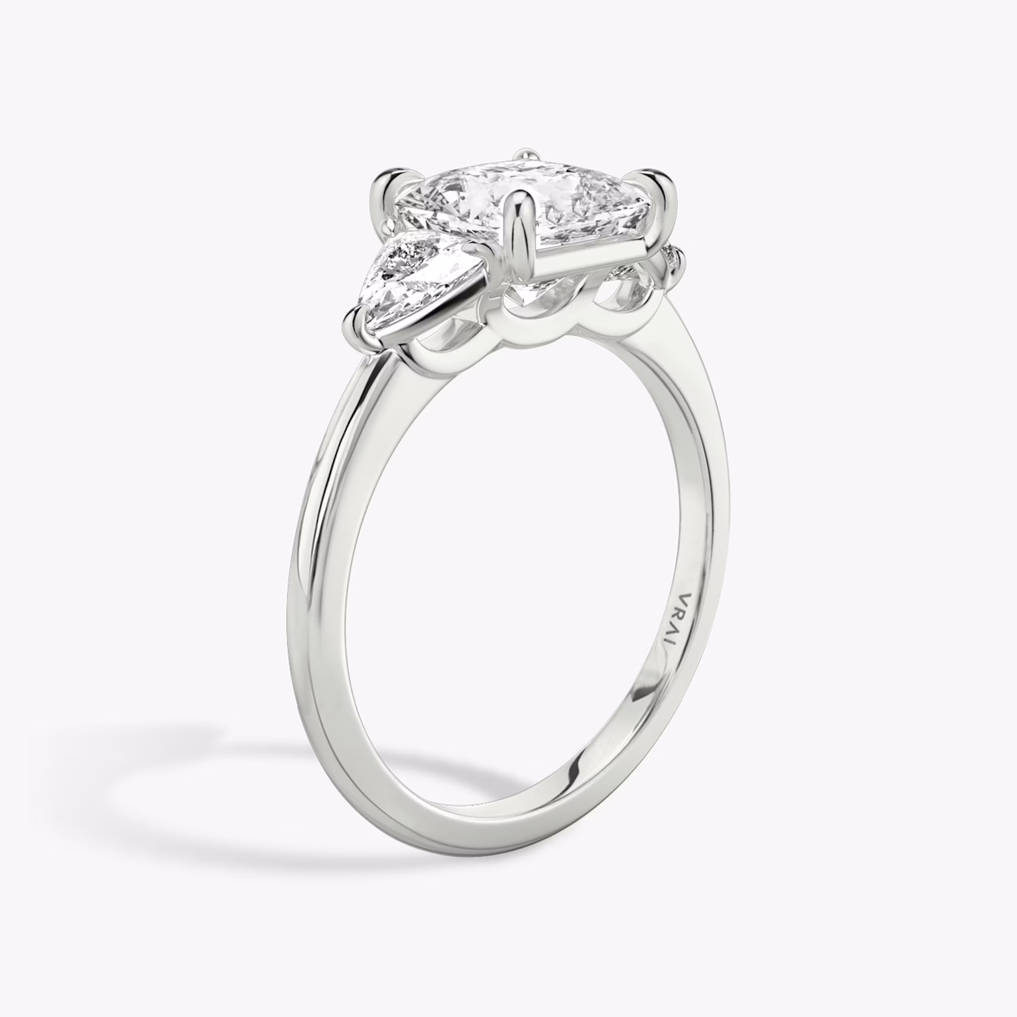 The Three Stone | Princess | 18k | White Gold | bandAccent: Plain | sideStoneCarat: 0.25ct | sideStoneShape: Trillion | diamondOrientation: vertical | caratWeight: other
