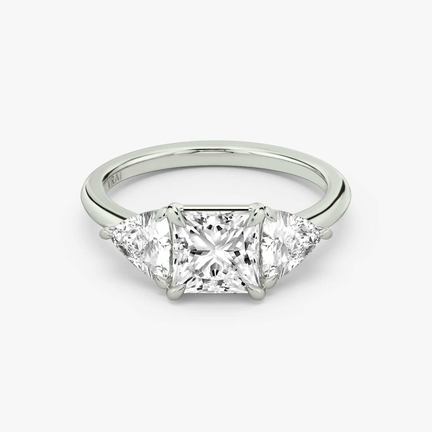 The Three Stone | Princess | Platinum | bandAccent: Plain | sideStoneCarat: 0.50ct | sideStoneShape: Trillion | diamondOrientation: vertical | caratWeight: other