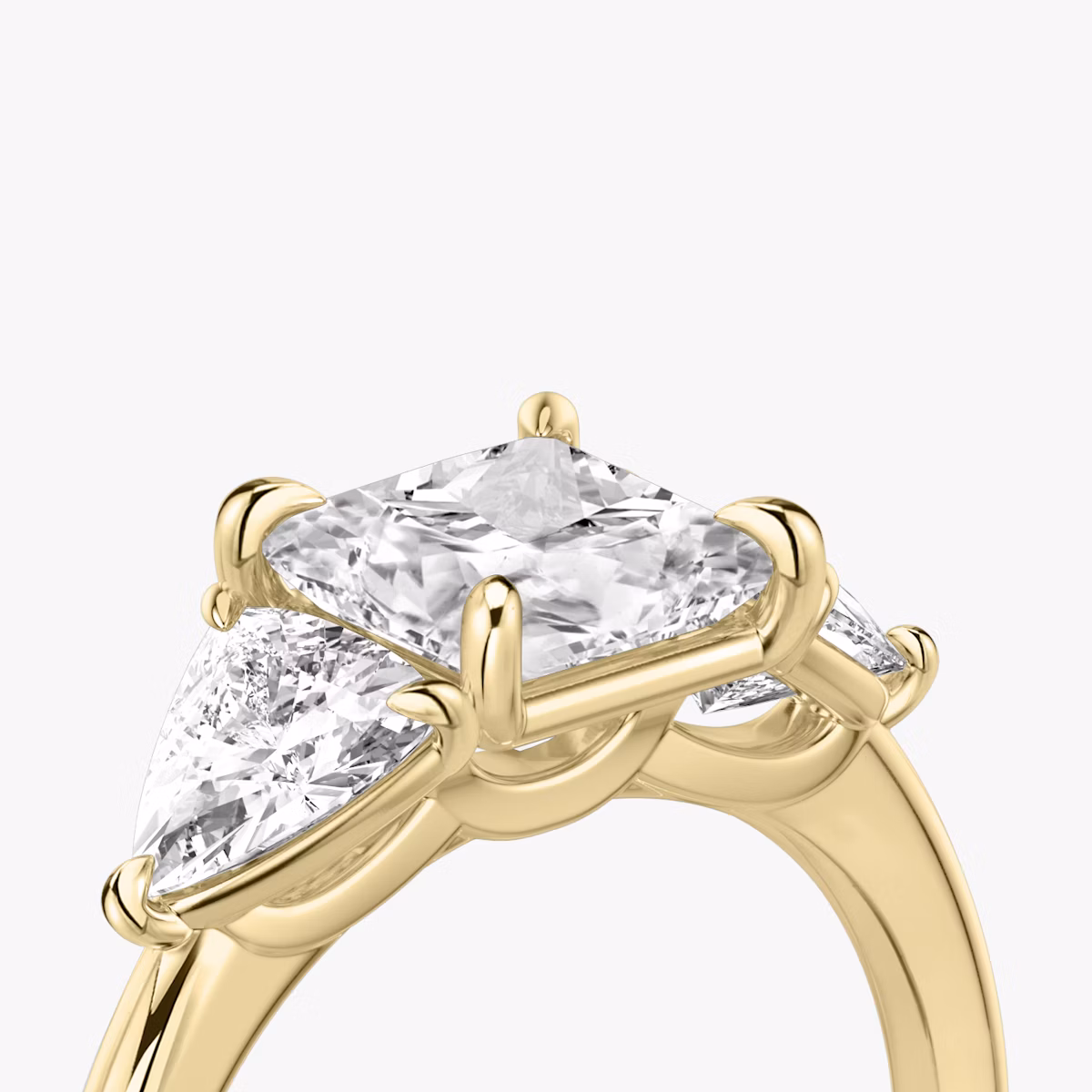 The Three Stone | Princess | 18k | Yellow Gold | bandAccent: Plain | sideStoneCarat: 0.50ct | sideStoneShape: Trillion | diamondOrientation: vertical | caratWeight: other