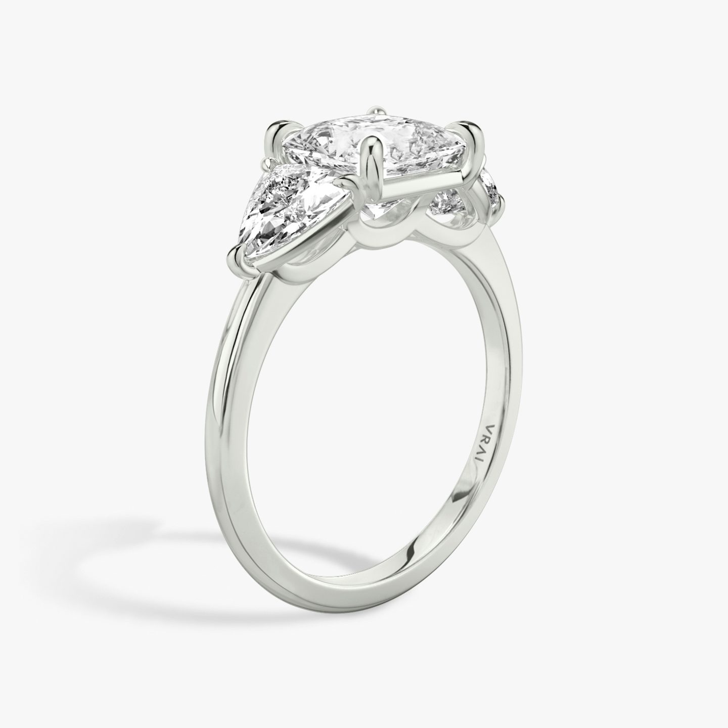 The Three Stone | Princess | Platinum | bandAccent: Plain | sideStoneCarat: 0.50ct | sideStoneShape: Trillion | diamondOrientation: vertical | caratWeight: other