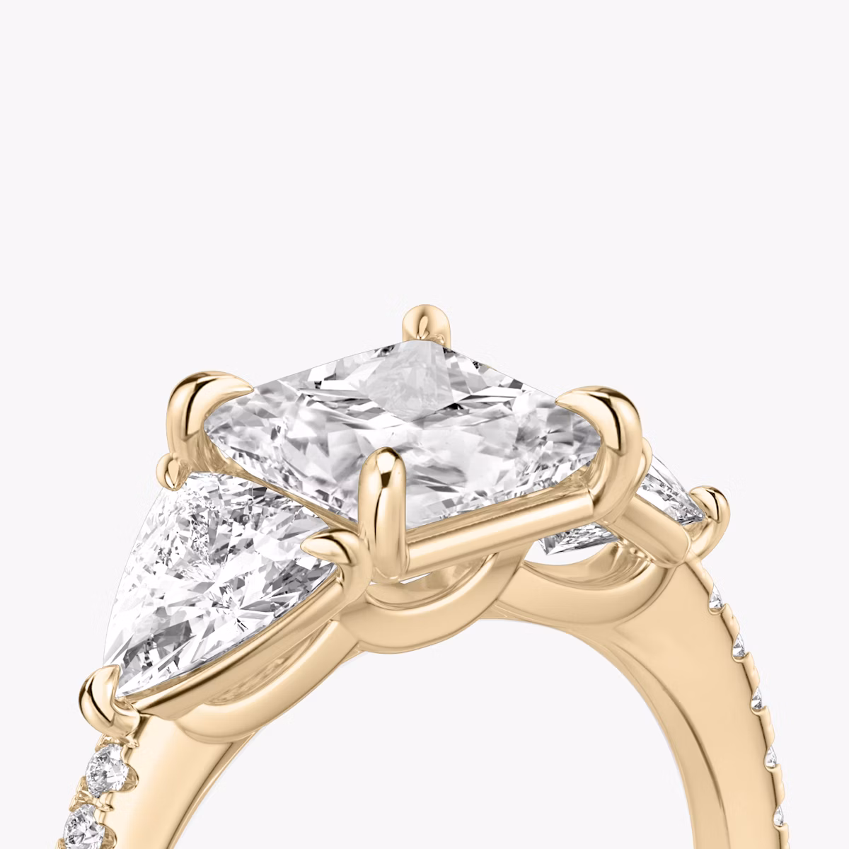 The Three Stone | Princess | 14k | Rose Gold | bandAccent: Pavé | sideStoneCarat: 0.50ct | sideStoneShape: Trillion | diamondOrientation: vertical | caratWeight: other