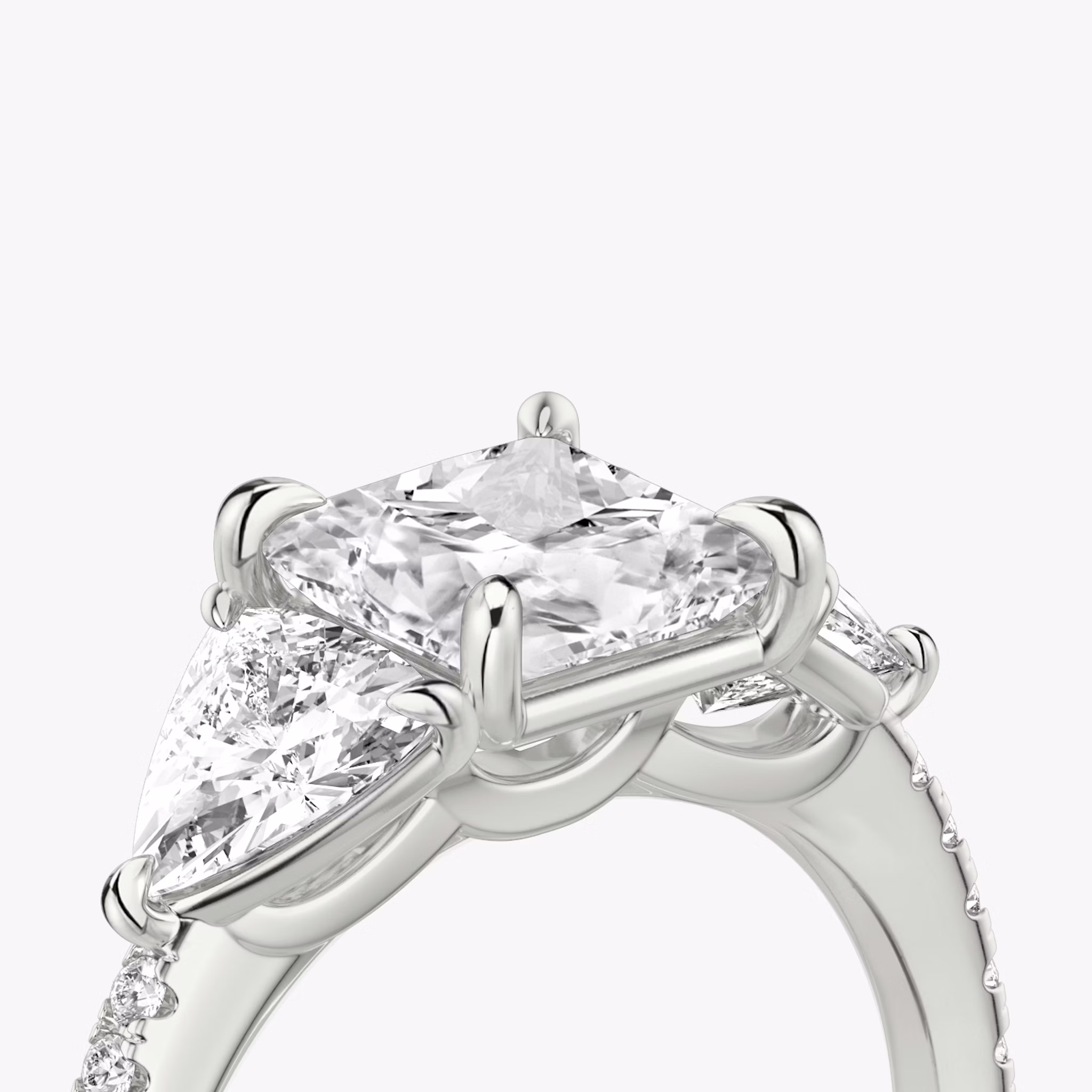The Three Stone | Princess | 18k | White Gold | bandAccent: Pavé | sideStoneCarat: 0.50ct | sideStoneShape: Trillion | diamondOrientation: vertical | caratWeight: other