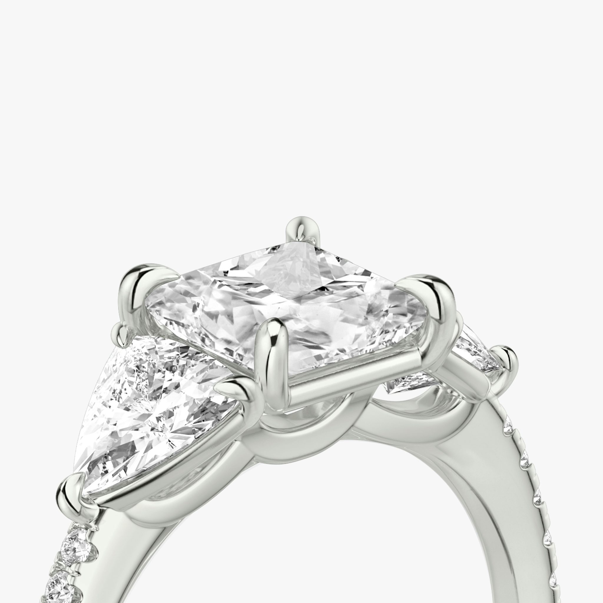 The Three Stone | Princess | 18k | White Gold | bandAccent: Pavé | sideStoneCarat: 0.50ct | sideStoneShape: Trillion | diamondOrientation: vertical | caratWeight: other