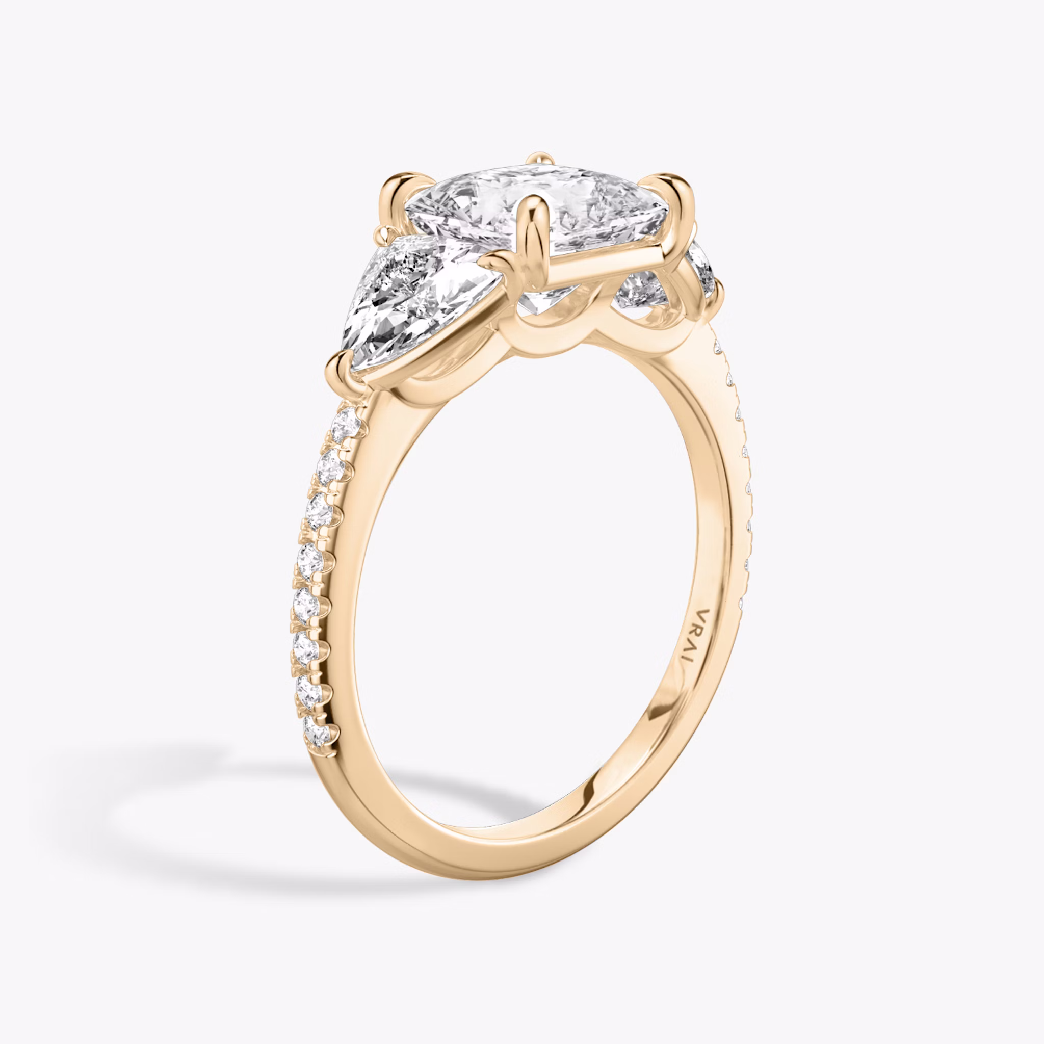 The Three Stone | Princess | 14k | Rose Gold | bandAccent: Pavé | sideStoneCarat: 0.50ct | sideStoneShape: Trillion | diamondOrientation: vertical | caratWeight: other