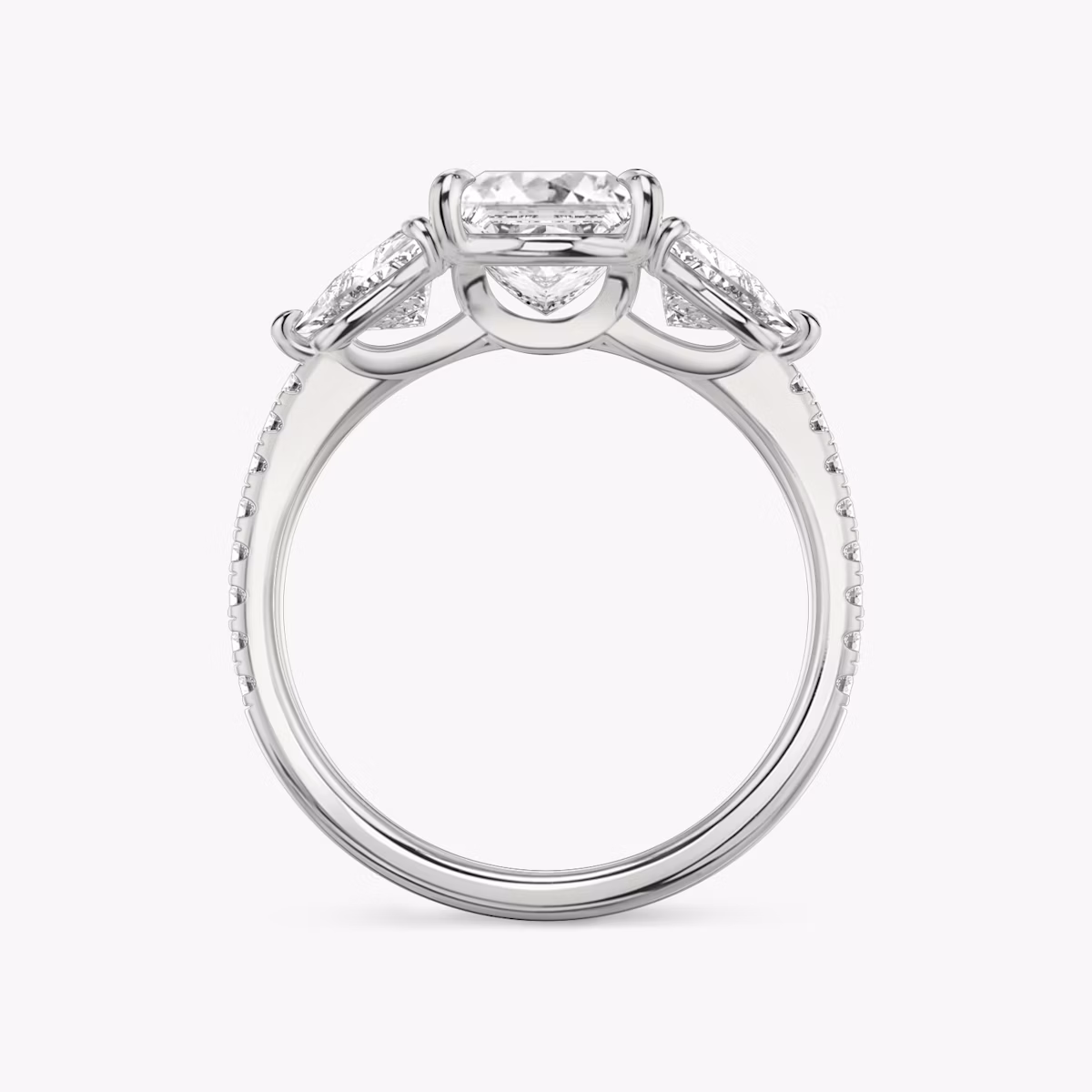 The Three Stone | Princess | Platinum | bandAccent: Pavé | sideStoneCarat: 0.50ct | sideStoneShape: Trillion | diamondOrientation: vertical | caratWeight: other