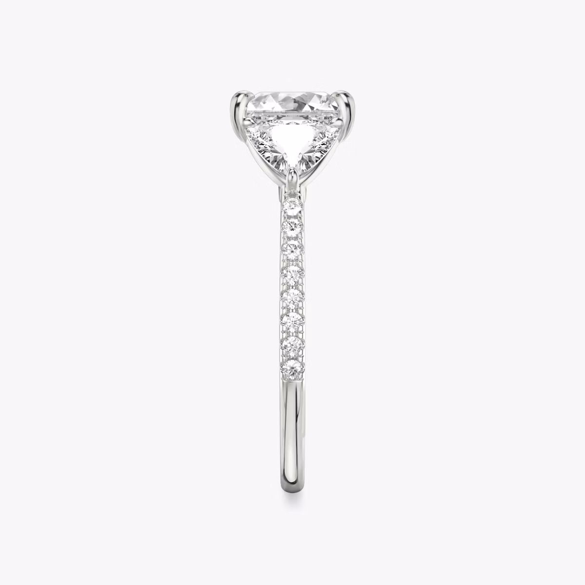 The Three Stone | Princess | Platinum | bandAccent: Pavé | sideStoneCarat: 0.50ct | sideStoneShape: Trillion | diamondOrientation: vertical | caratWeight: other