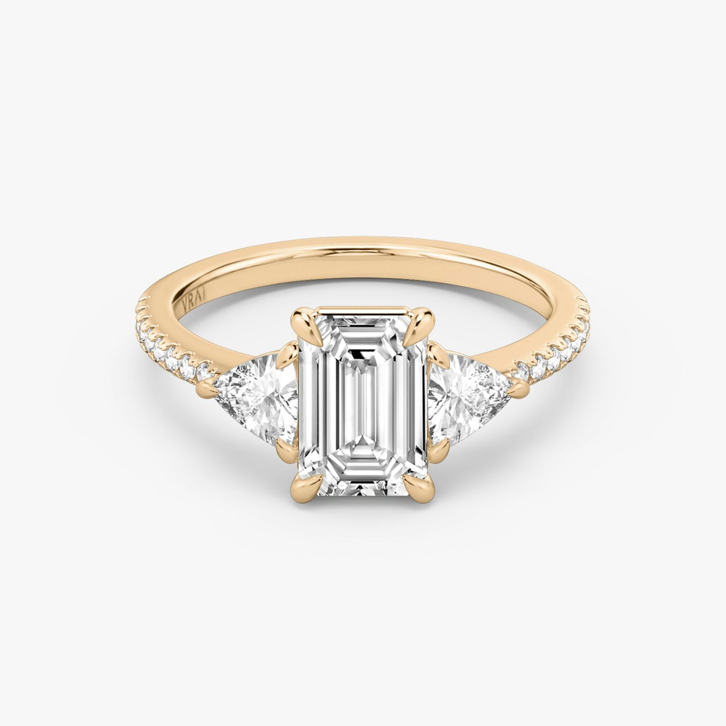 The Three Stone | Emerald | 14k | Rose Gold | bandAccent: Pavé | sideStoneCarat: 0.25ct | sideStoneShape: Trillion | diamondOrientation: vertical | caratWeight: other