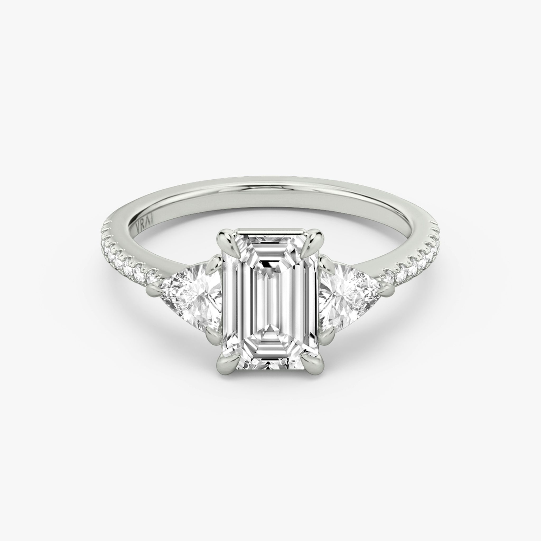 The Three Stone | Emerald | 18k | White Gold | bandAccent: Pavé | sideStoneCarat: 0.25ct | sideStoneShape: Trillion | diamondOrientation: vertical | caratWeight: other