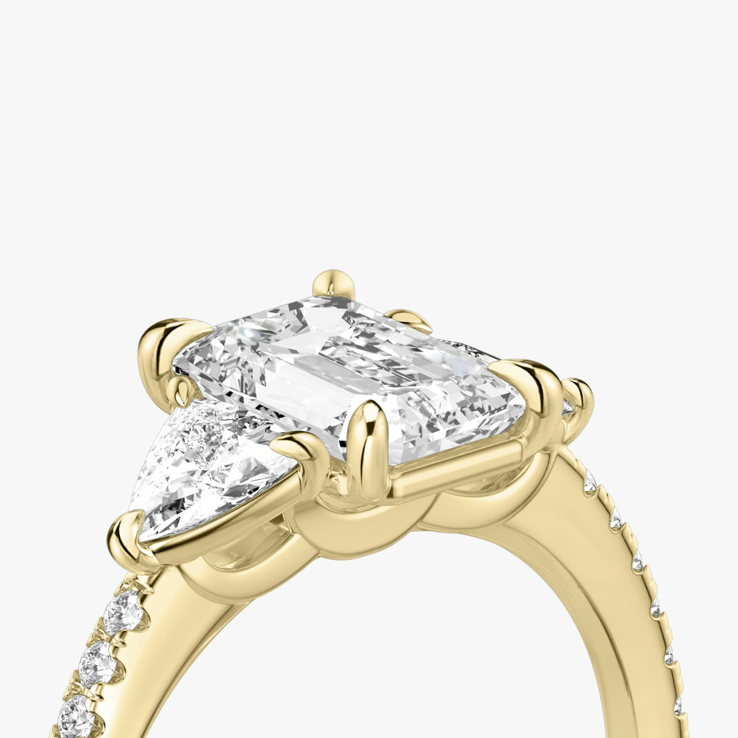 The Three Stone | Emerald | 18k | Yellow Gold | bandAccent: Pavé | sideStoneCarat: 0.25ct | sideStoneShape: Trillion | diamondOrientation: vertical | caratWeight: other