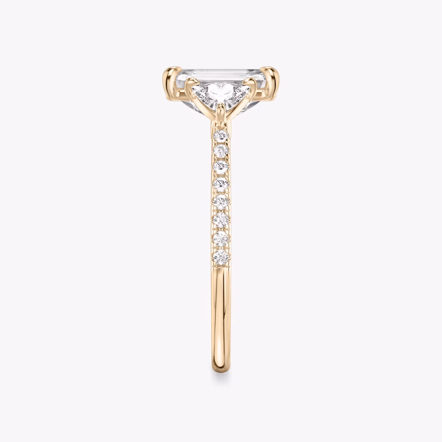 The Three Stone | Emerald | 14k | Rose Gold | bandAccent: Pavé | sideStoneCarat: 0.25ct | sideStoneShape: Trillion | diamondOrientation: vertical | caratWeight: other