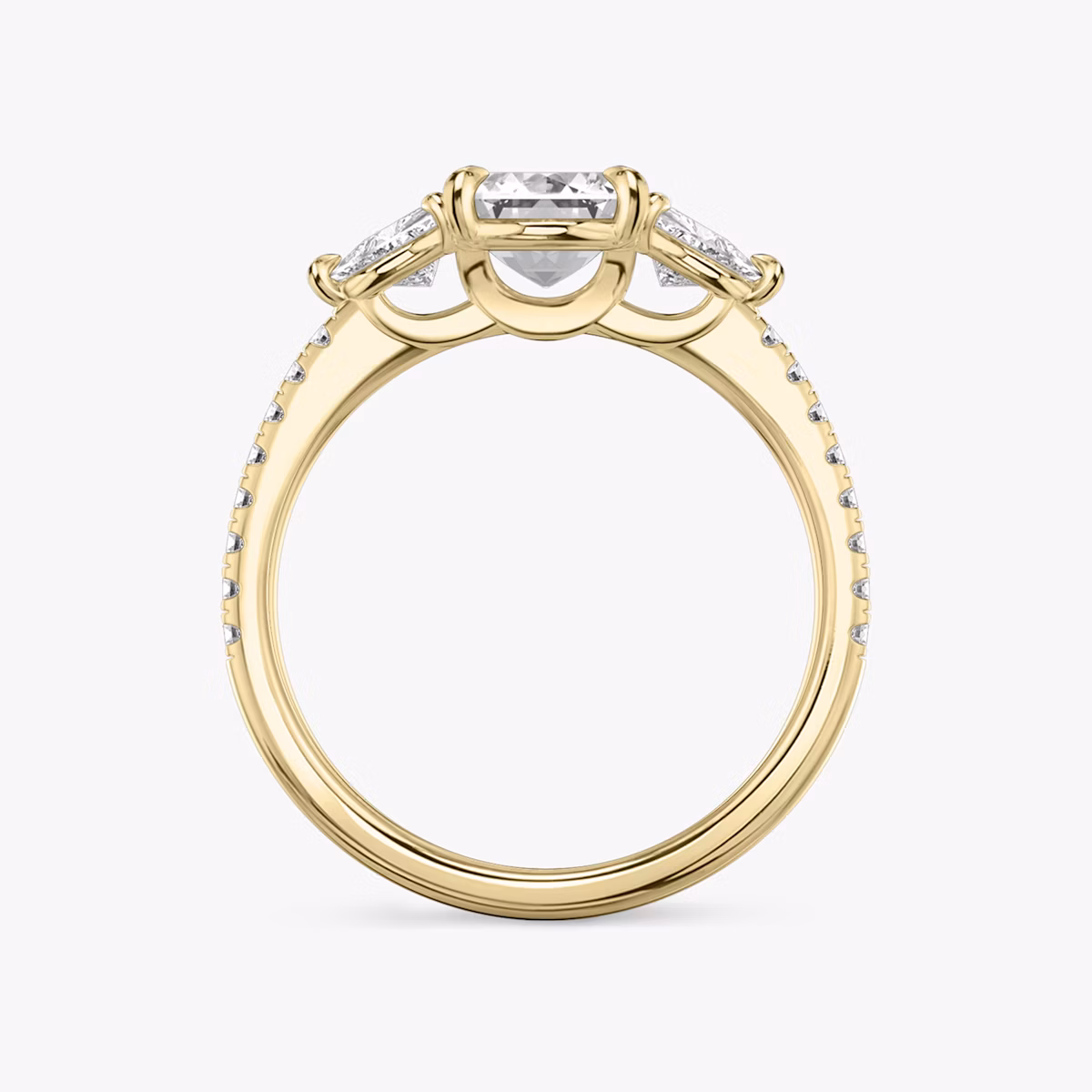 The Three Stone | Emerald | 18k | Yellow Gold | bandAccent: Pavé | sideStoneCarat: 0.25ct | sideStoneShape: Trillion | diamondOrientation: vertical | caratWeight: other