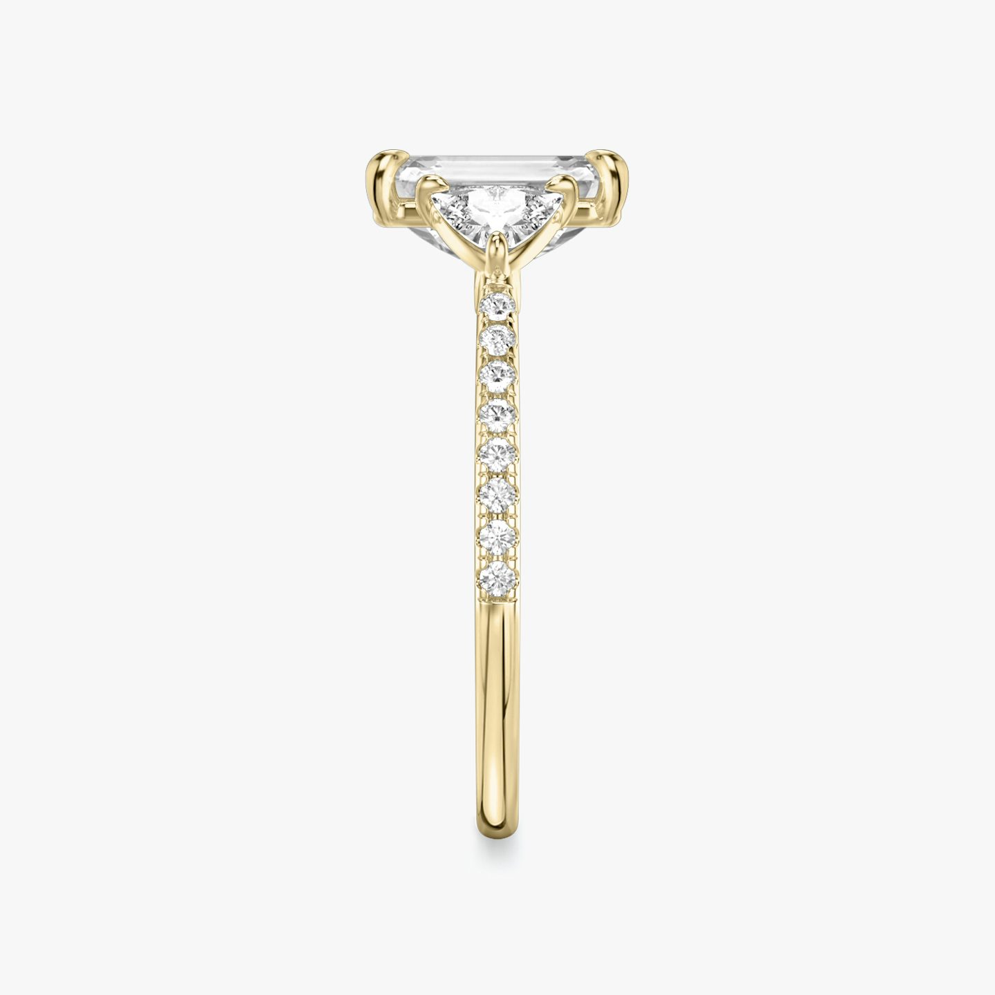 The Three Stone | Emerald | 18k | Yellow Gold | bandAccent: Pavé | sideStoneCarat: 0.25ct | sideStoneShape: Trillion | diamondOrientation: vertical | caratWeight: other