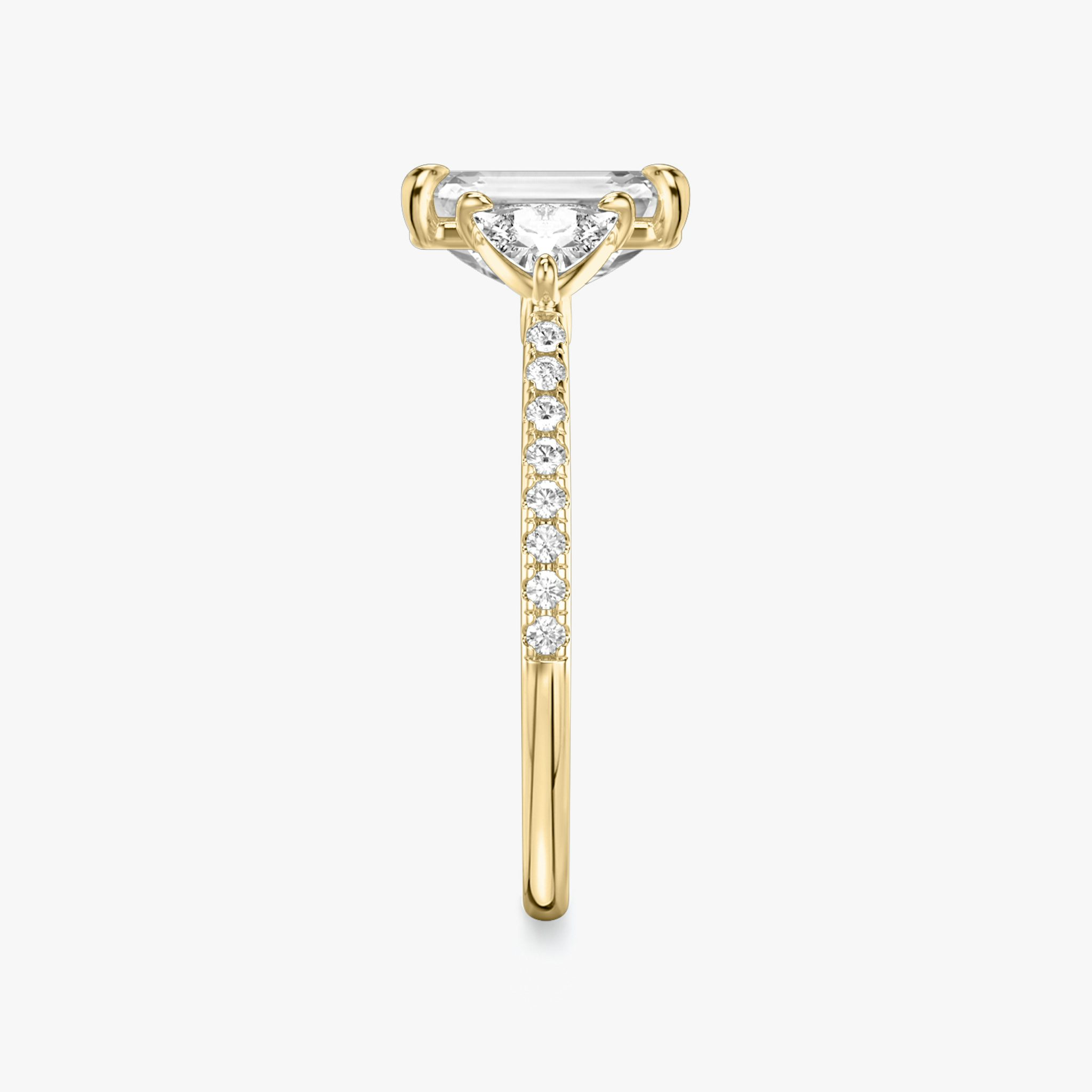 The Three Stone | Emerald | 18k | Yellow Gold | bandAccent: Pavé | sideStoneCarat: 0.25ct | sideStoneShape: Trillion | diamondOrientation: vertical | caratWeight: other